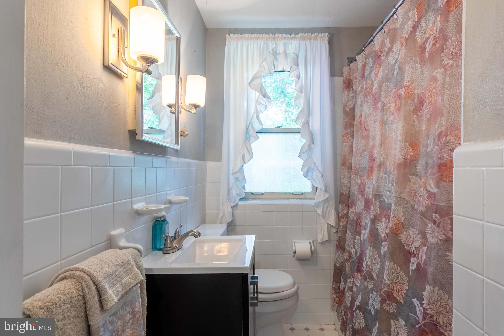 1042 Thrush Lane Norristown, PA 19403 - Photo 14 of 30 a bathroom with a sink toilet and shower