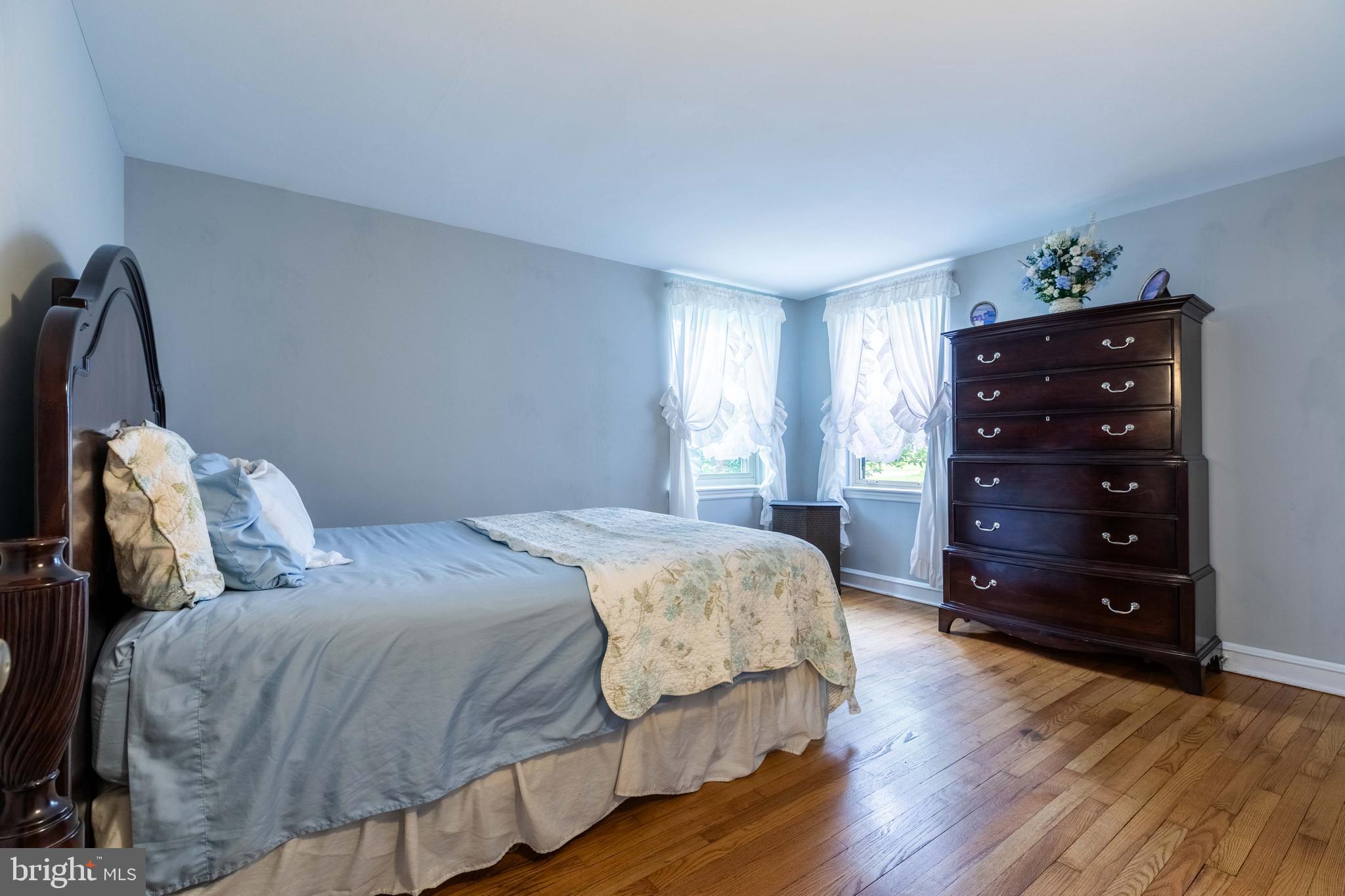 1042 Thrush Lane Norristown, PA 19403 - Photo 15 of 30 a bedroom with a bed and a dresser
