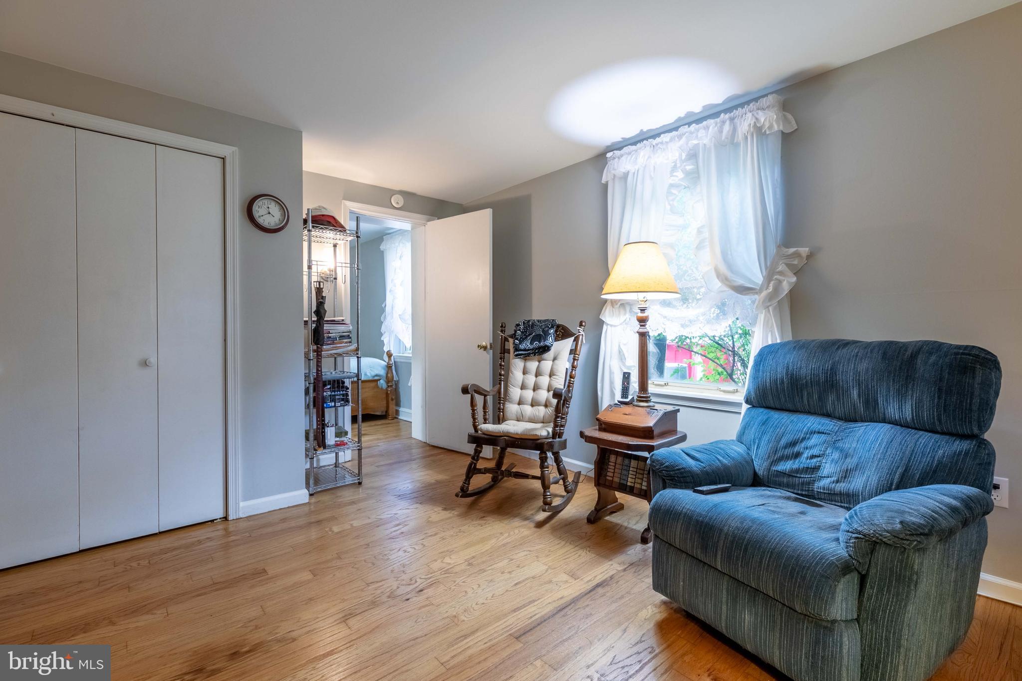 1042 Thrush Lane Norristown, PA 19403 - Photo 21 of 30 a living room with furniture and a wooden floor