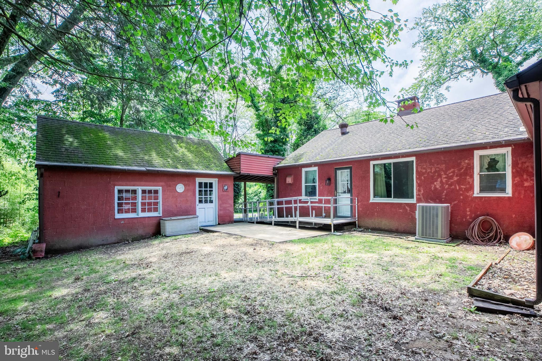 1042 Thrush Lane Norristown, PA 19403 - Photo 25 of 30 a view of a house with a yard and large tree