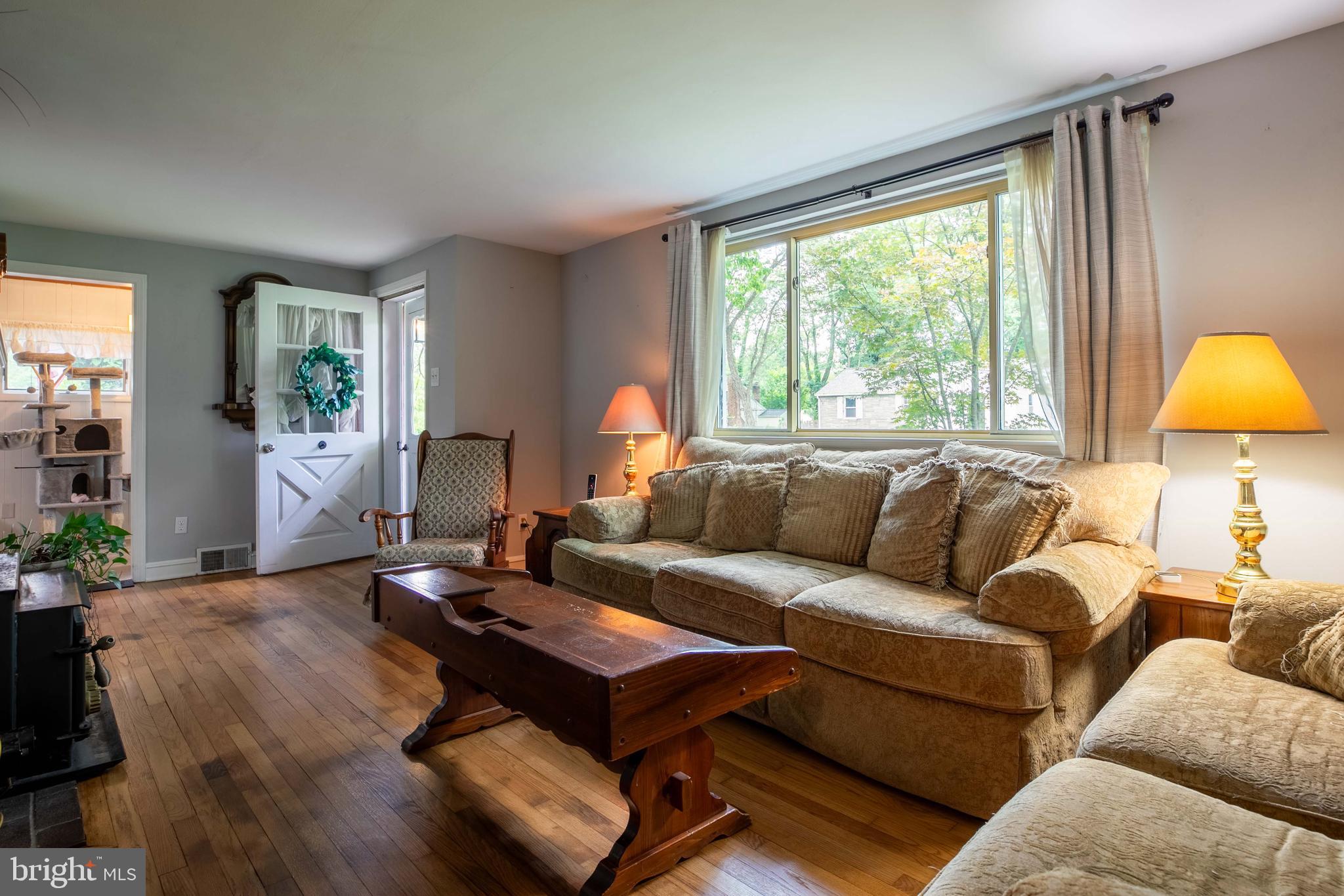 1042 Thrush Lane Norristown, PA 19403 - Photo 3 of 30 a living room with furniture and a large window