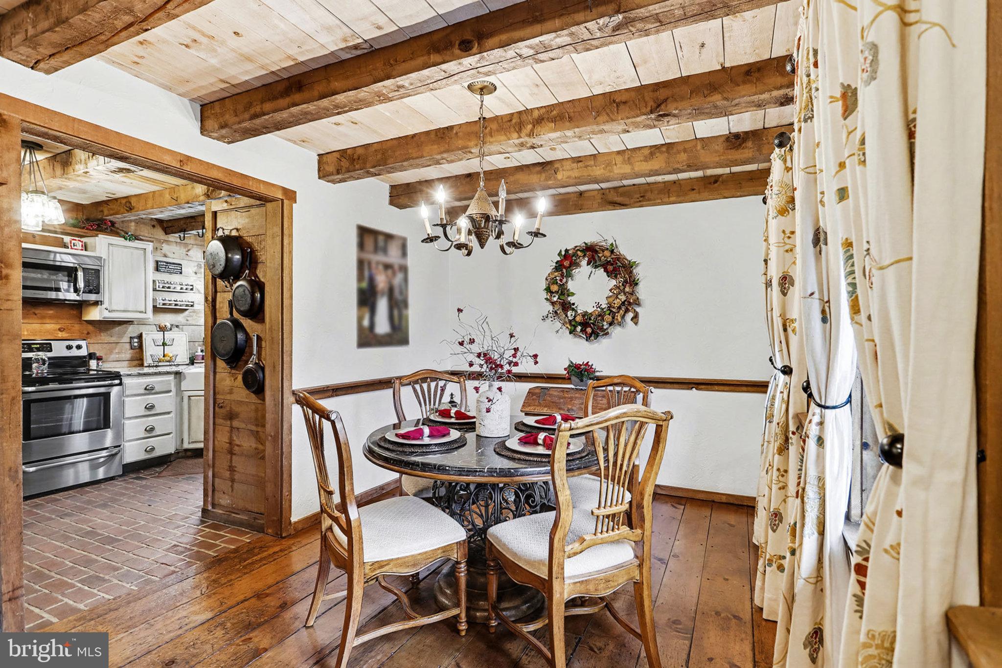 27 Ridge Road Lititz, PA 17543 - Photo 20 of 61 a view of a dining area with furniture and wooden floor