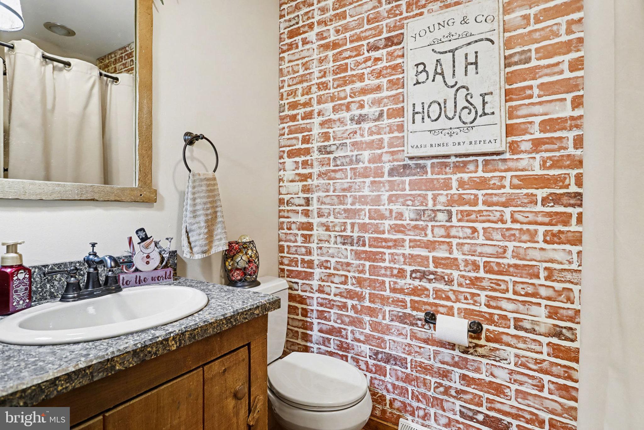 27 Ridge Road Lititz, PA 17543 - Photo 21 of 61 a bathroom with a granite countertop sink toilet and shower