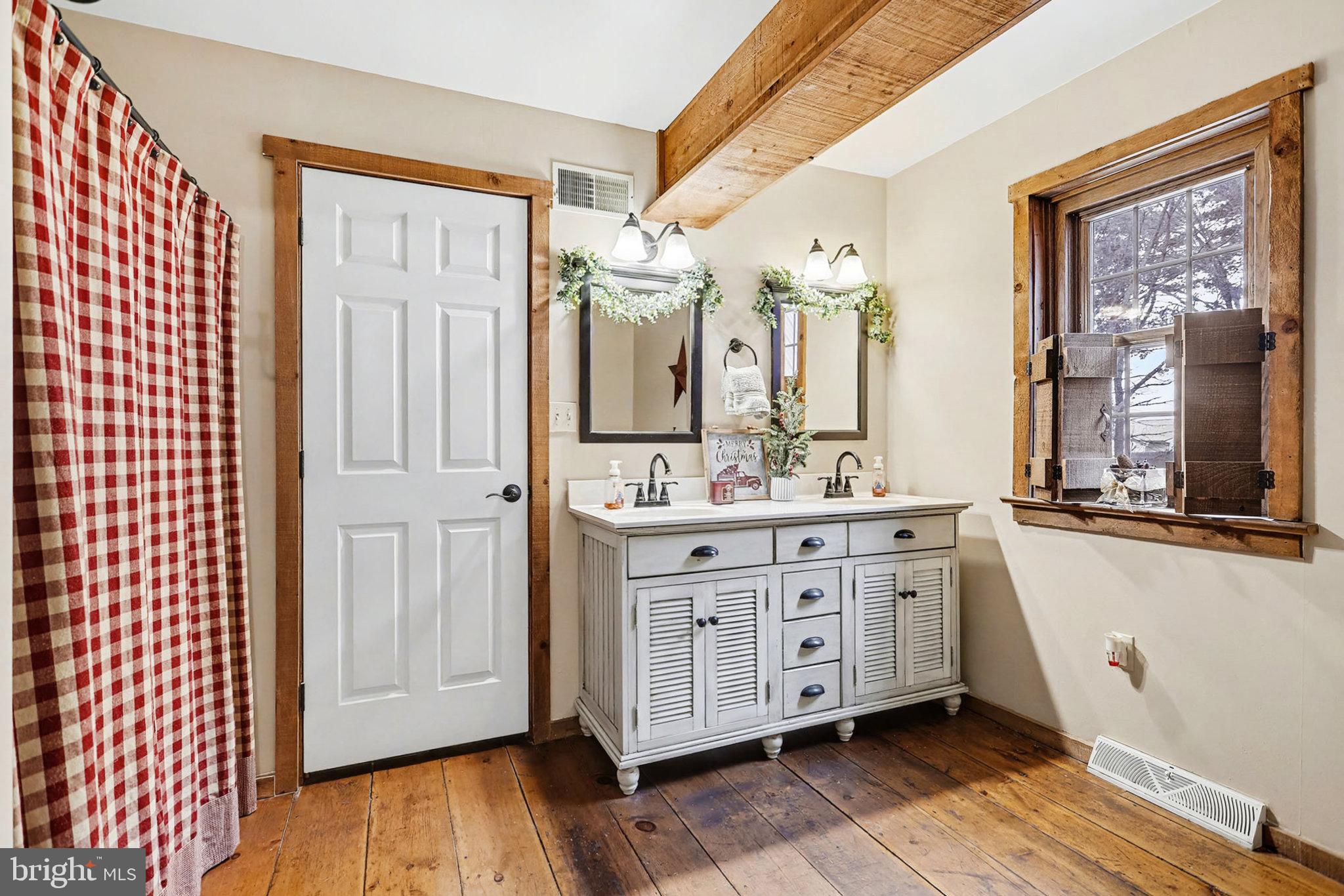 27 Ridge Road Lititz, PA 17543 - Photo 29 of 61 a spacious bathroom with a double vanity sink a mirror and a shower