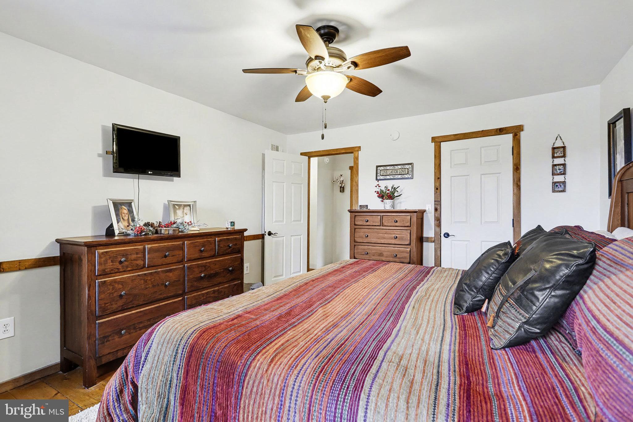 27 Ridge Road Lititz, PA 17543 - Photo 31 of 61 a bedroom with a bed and a flat screen tv