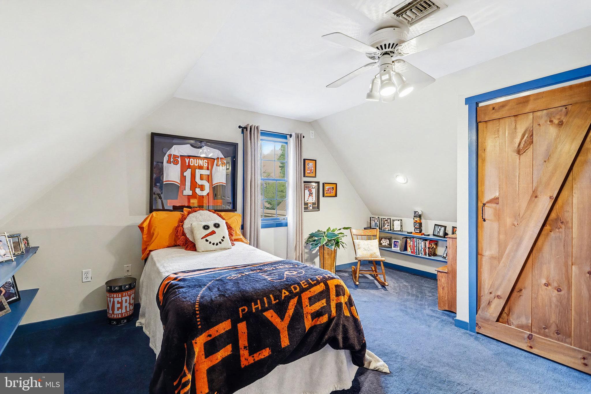 27 Ridge Road Lititz, PA 17543 - Photo 39 of 61 a bedroom with a bed and a chandelier