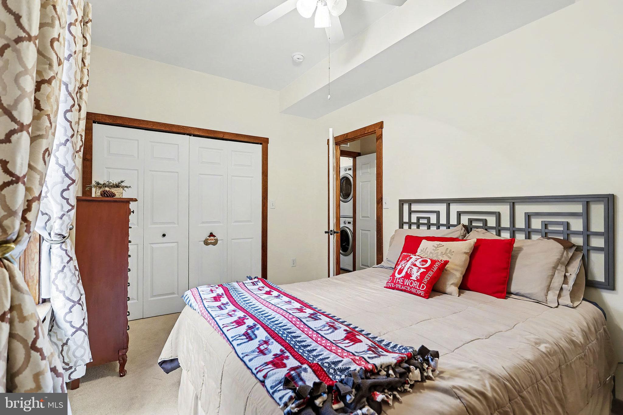 27 Ridge Road Lititz, PA 17543 - Photo 47 of 61 a bedroom with bed and a chandelier