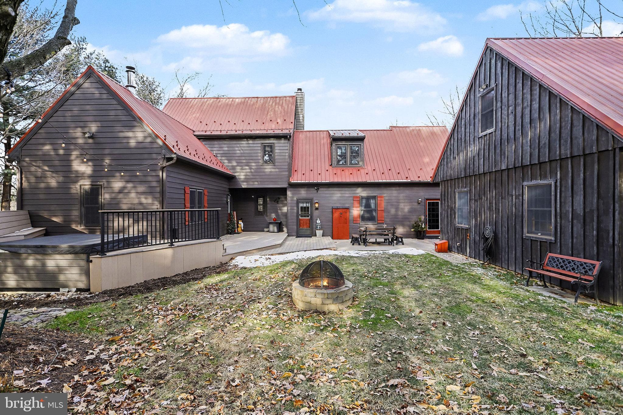 27 Ridge Road Lititz, PA 17543 - Photo 9 of 61 a view of a chair and table in backyard of the house