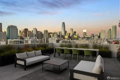 a view of a terrace with sitting area