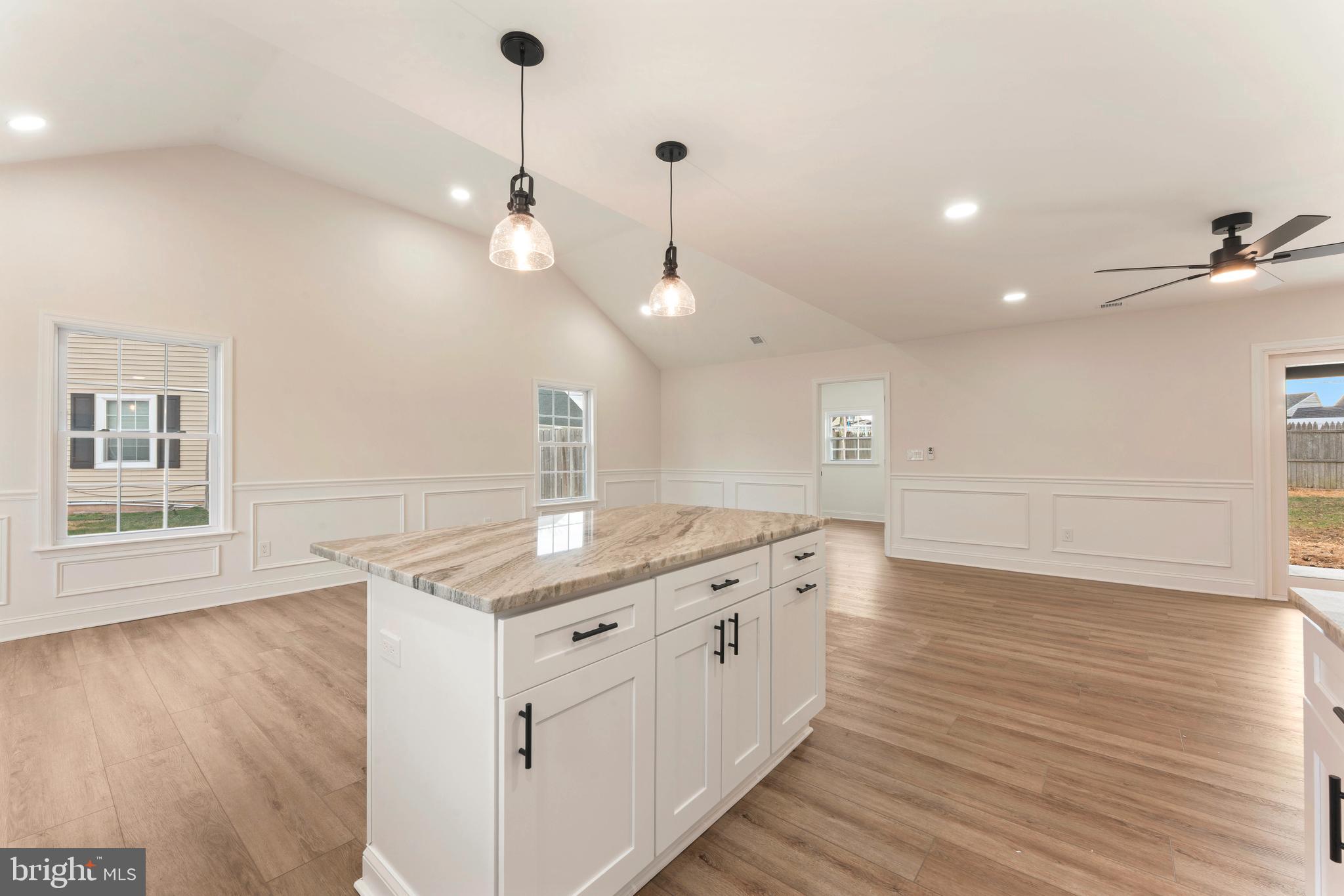 122 Ivy Hill Road Levittown, PA 19057 - Photo 13 of 36 a kitchen with a sink and wooden floor