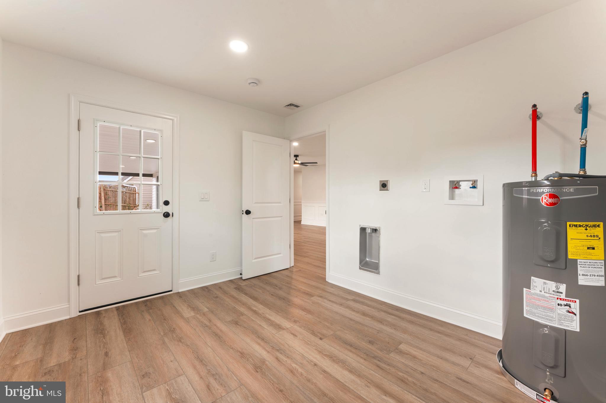 122 Ivy Hill Road Levittown, PA 19057 - Photo 19 of 36 a view of a livingroom with wooden floor and a window