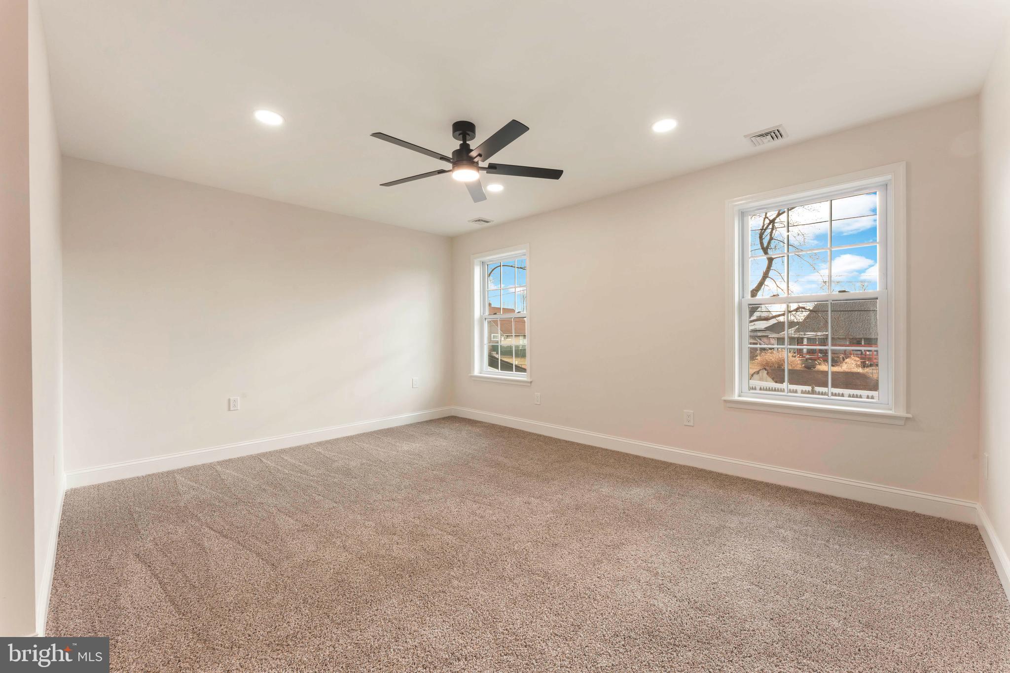 122 Ivy Hill Road Levittown, PA 19057 - Photo 20 of 36 a view of an empty room with a window