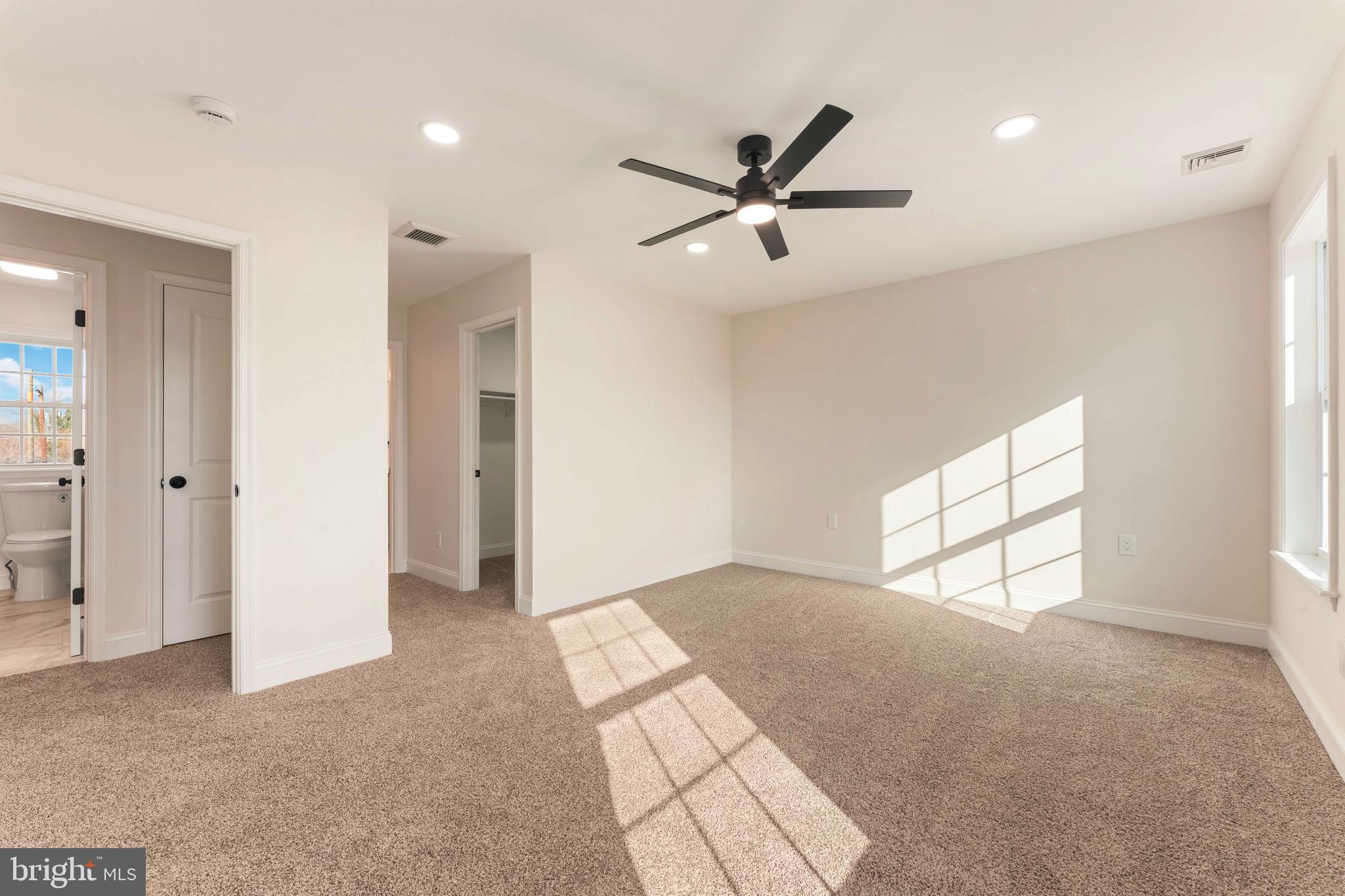 122 Ivy Hill Road Levittown, PA 19057 - Photo 22 of 36 a view of empty room with window and ceiling fan