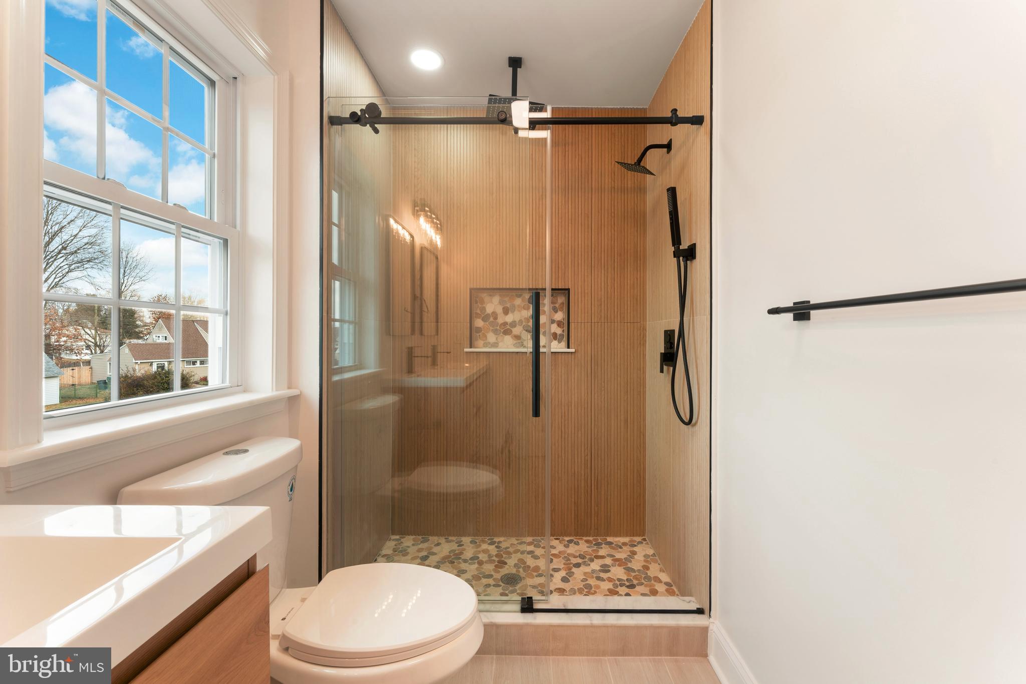 122 Ivy Hill Road Levittown, PA 19057 - Photo 26 of 36 a bathroom with a shower toilet and sink