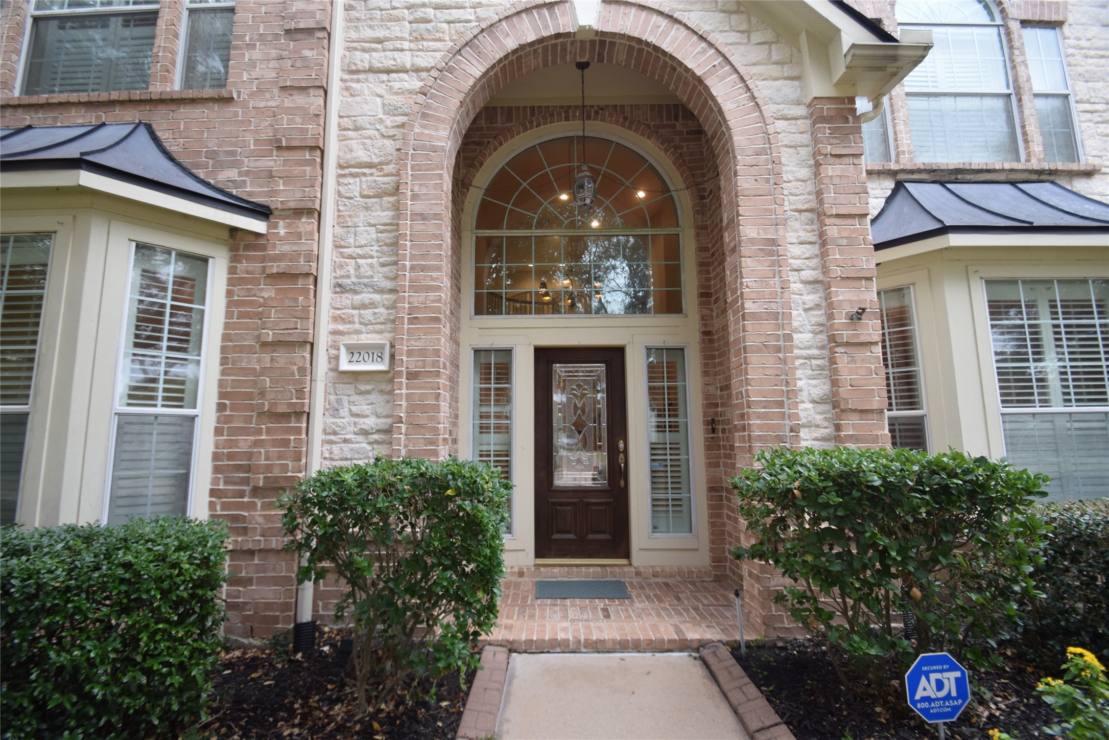 22018 Rustic Shores Lane Katy, TX 77450 - Photo 3 of 46 Arched front doorway inviting you inside.