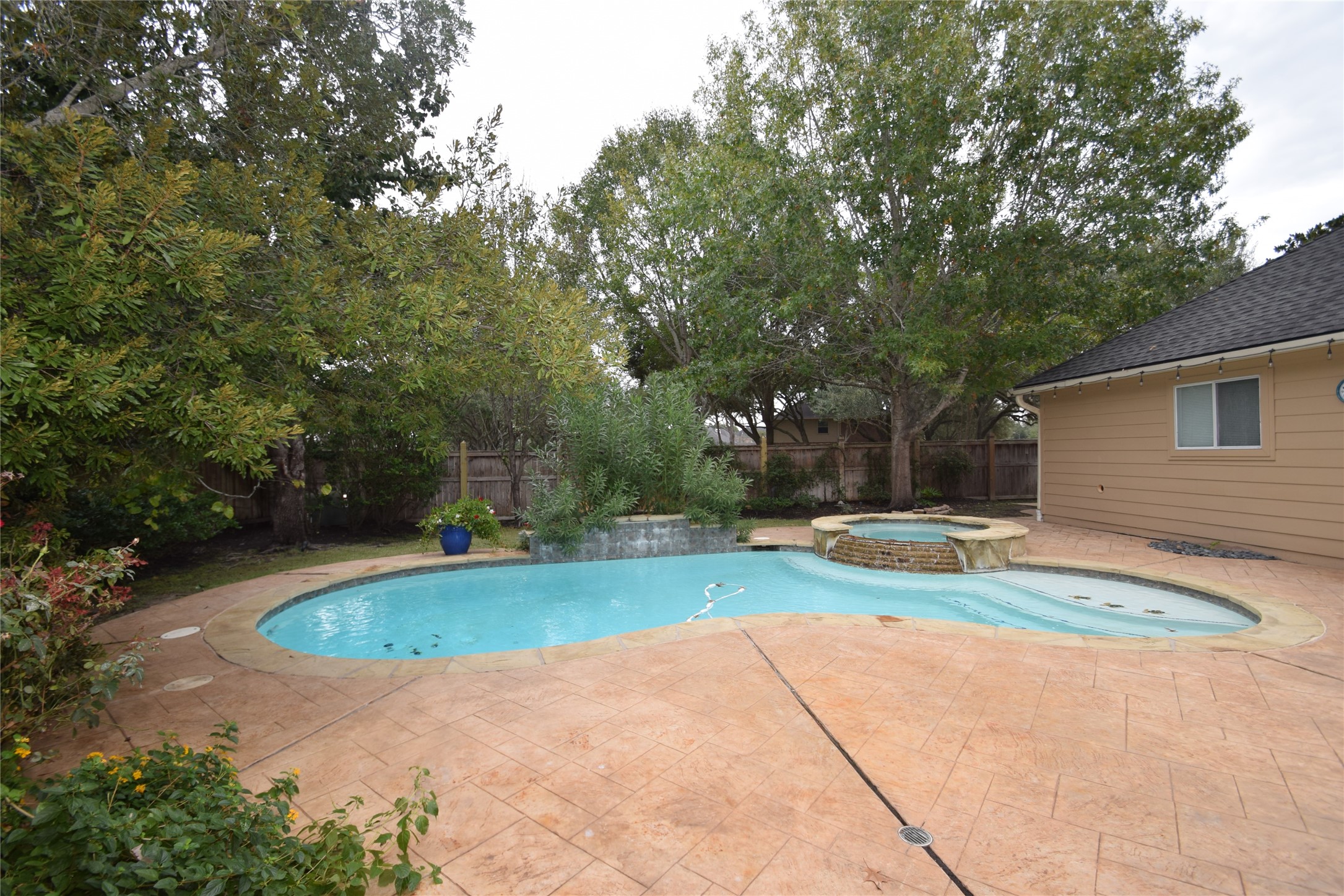 22018 Rustic Shores Lane Katy, TX 77450 - Photo 41 of 46 Sparkling pool and spa in the fully fenced backyard.
