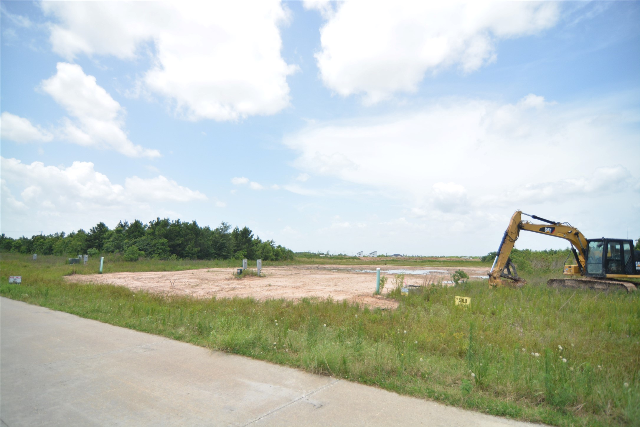 a view of a lake with a big yard