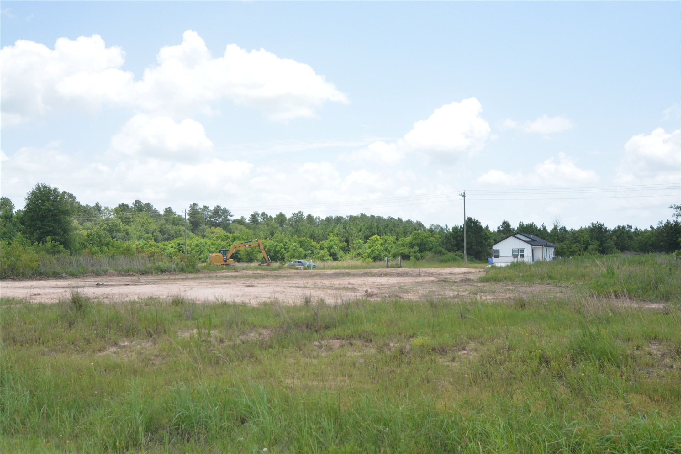 7714 Amanda Road Cleveland, TX 77327 - Photo 11 of 16 a view of an outdoor space and a yard