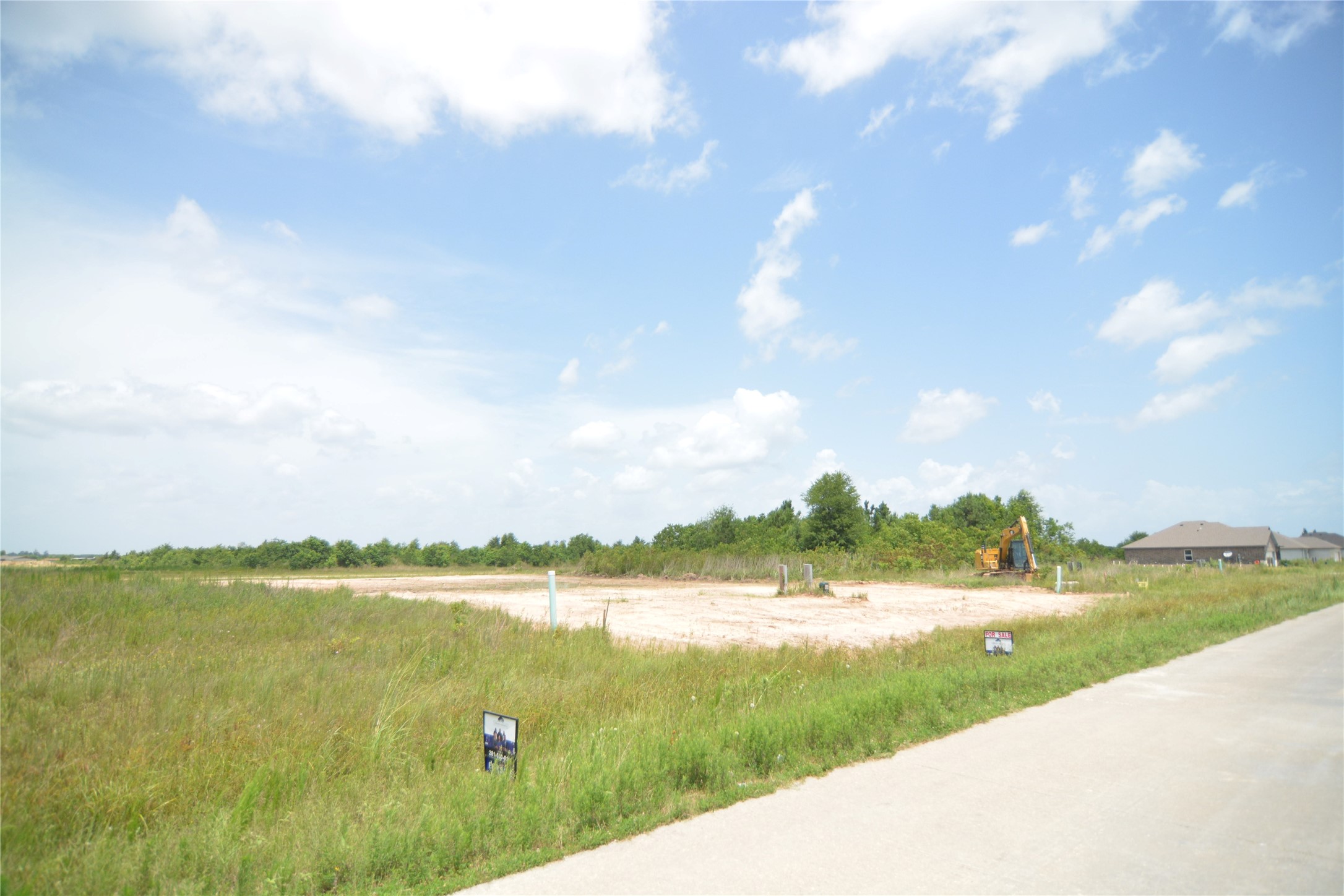 7714 Amanda Road Cleveland, TX 77327 - Photo 5 of 16 a view of a lake with a big yard