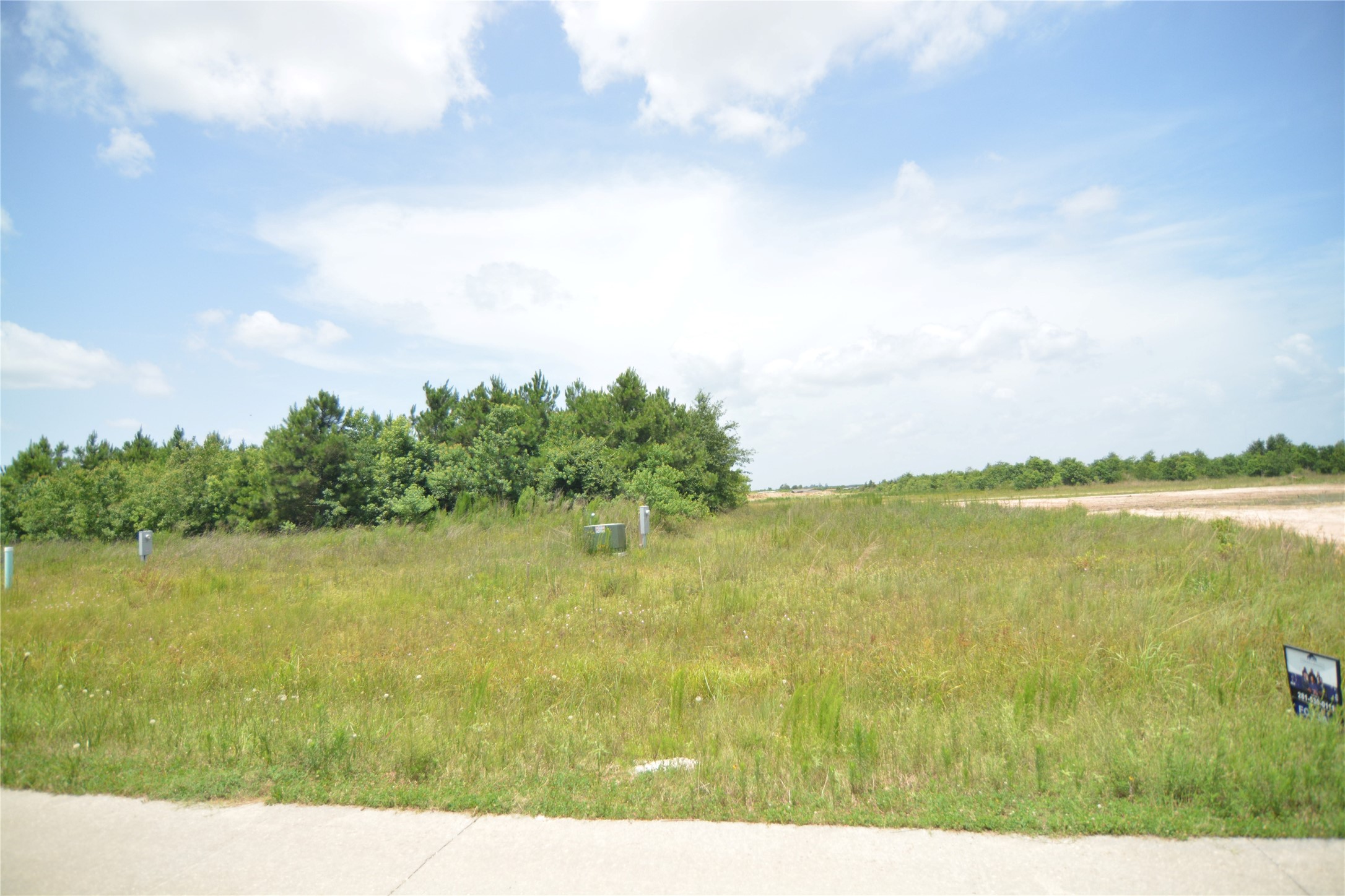 7714 Amanda Road Cleveland, TX 77327 - Photo 7 of 16 a view of lake and mountain