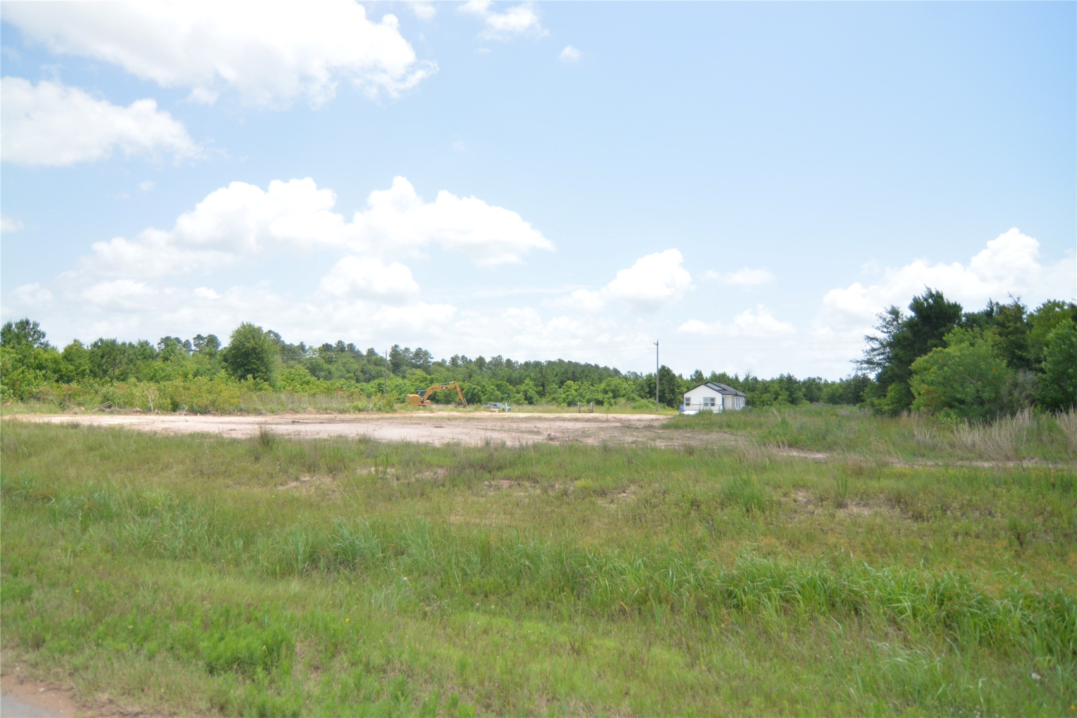 7714 Amanda Road Cleveland, TX 77327 - Photo 10 of 16 a view of lake with green space