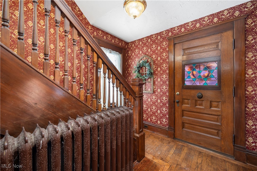 26902 Butternut Ridge Road North Olmsted, OH 44070 - Photo 14 of 38 Foyer with radiator, dark wood flooring, stairway