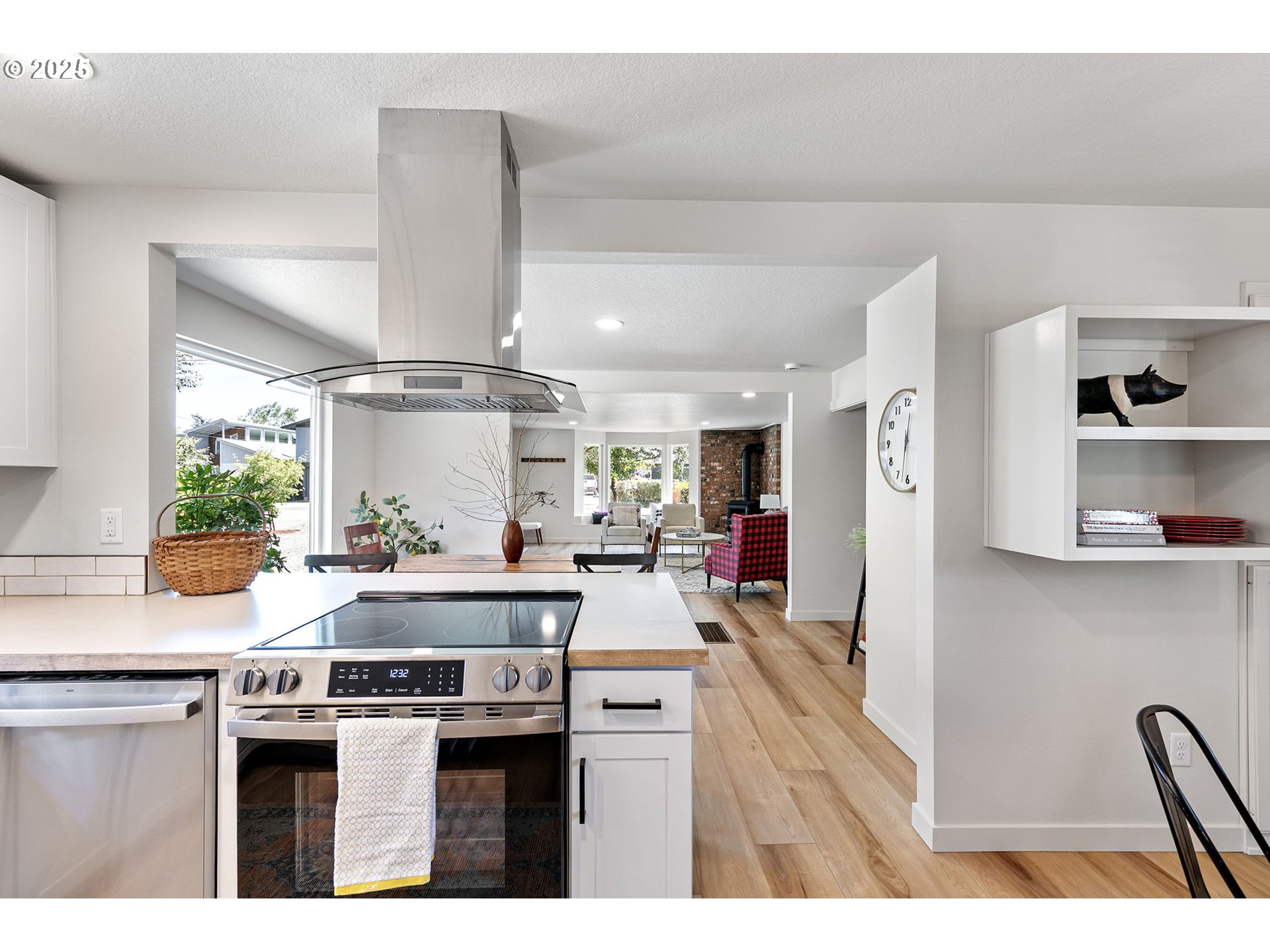 1938 7th Street Springfield, OR 97477 - Photo 16 of 48 a kitchen with stainless steel appliances a stove a sink and a refrigerator