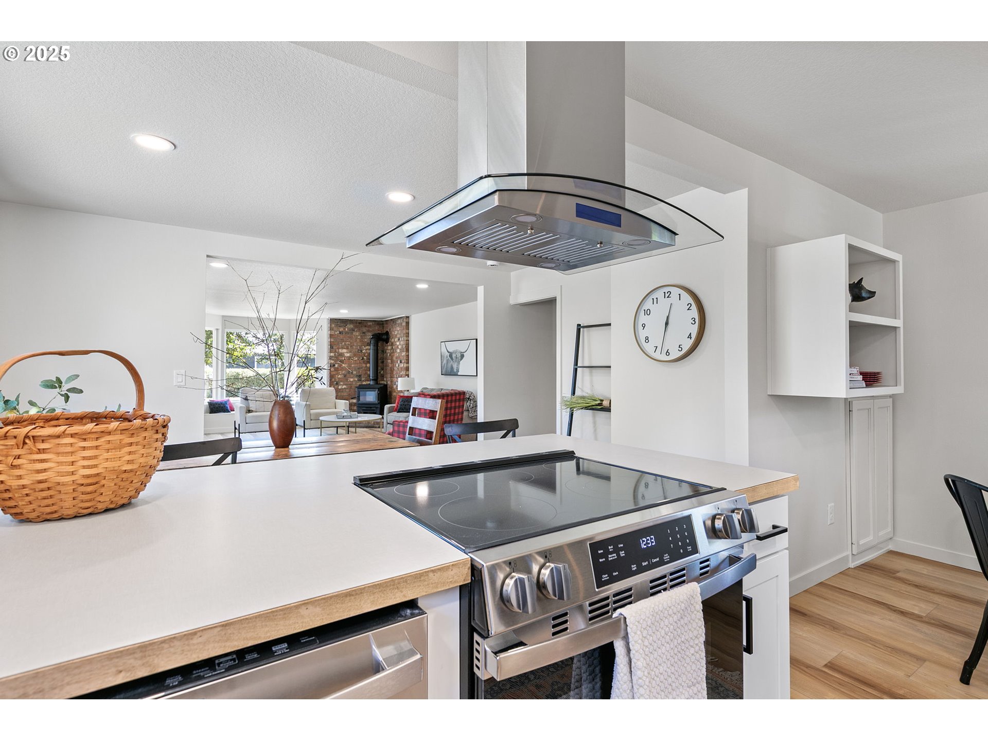 1938 7th Street Springfield, OR 97477 - Photo 19 of 48 a kitchen with a sink a stove and chairs