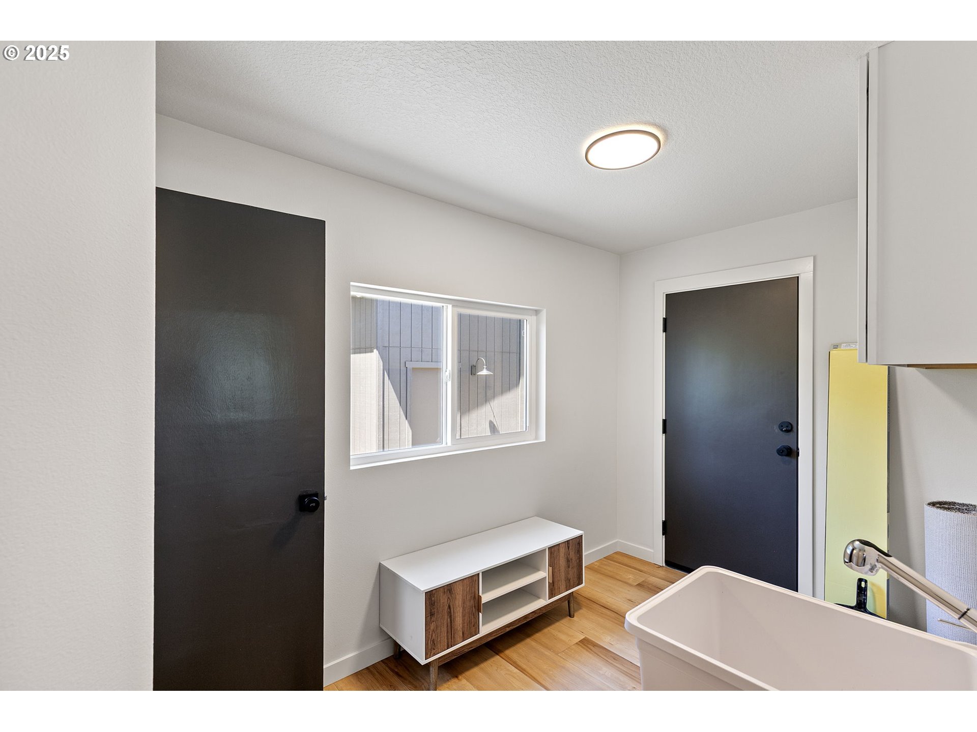 1938 7th Street Springfield, OR 97477 - Photo 20 of 48 a bedroom with a bed and a window