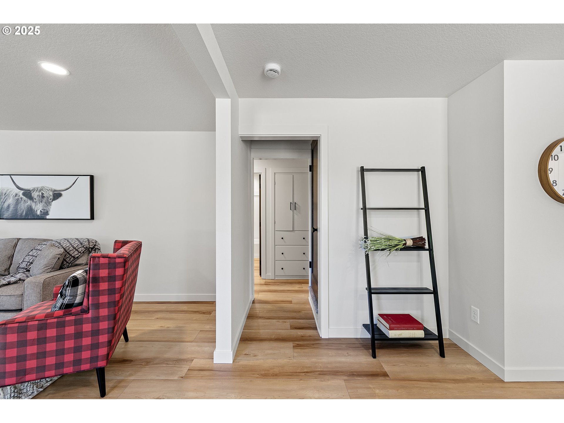 1938 7th Street Springfield, OR 97477 - Photo 24 of 48 a living room with furniture and a wooden floor