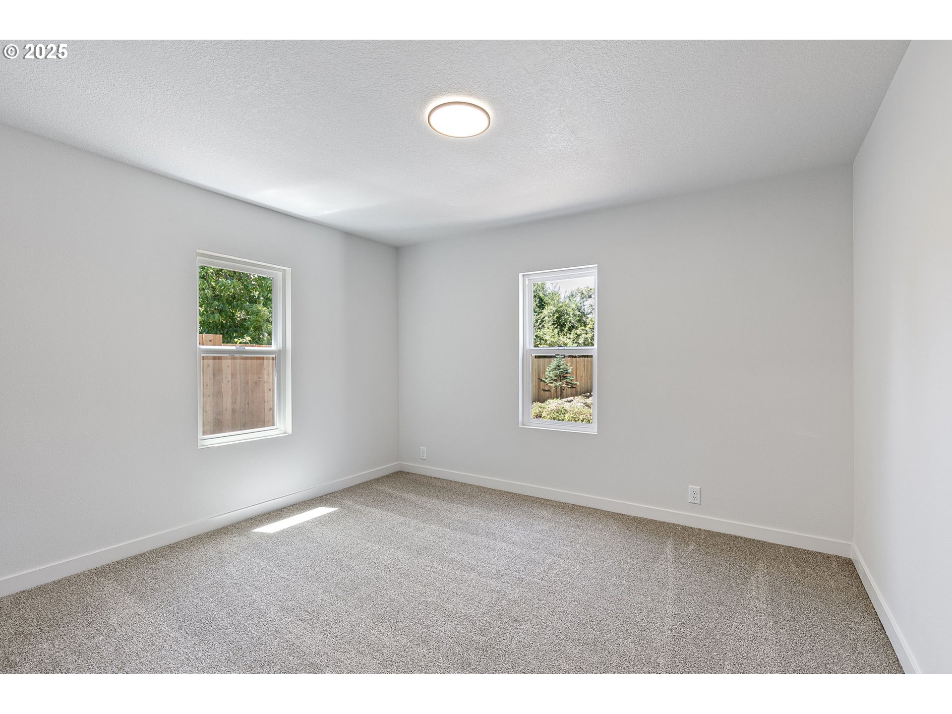 1938 7th Street Springfield, OR 97477 - Photo 25 of 48 a view of an empty room with a window