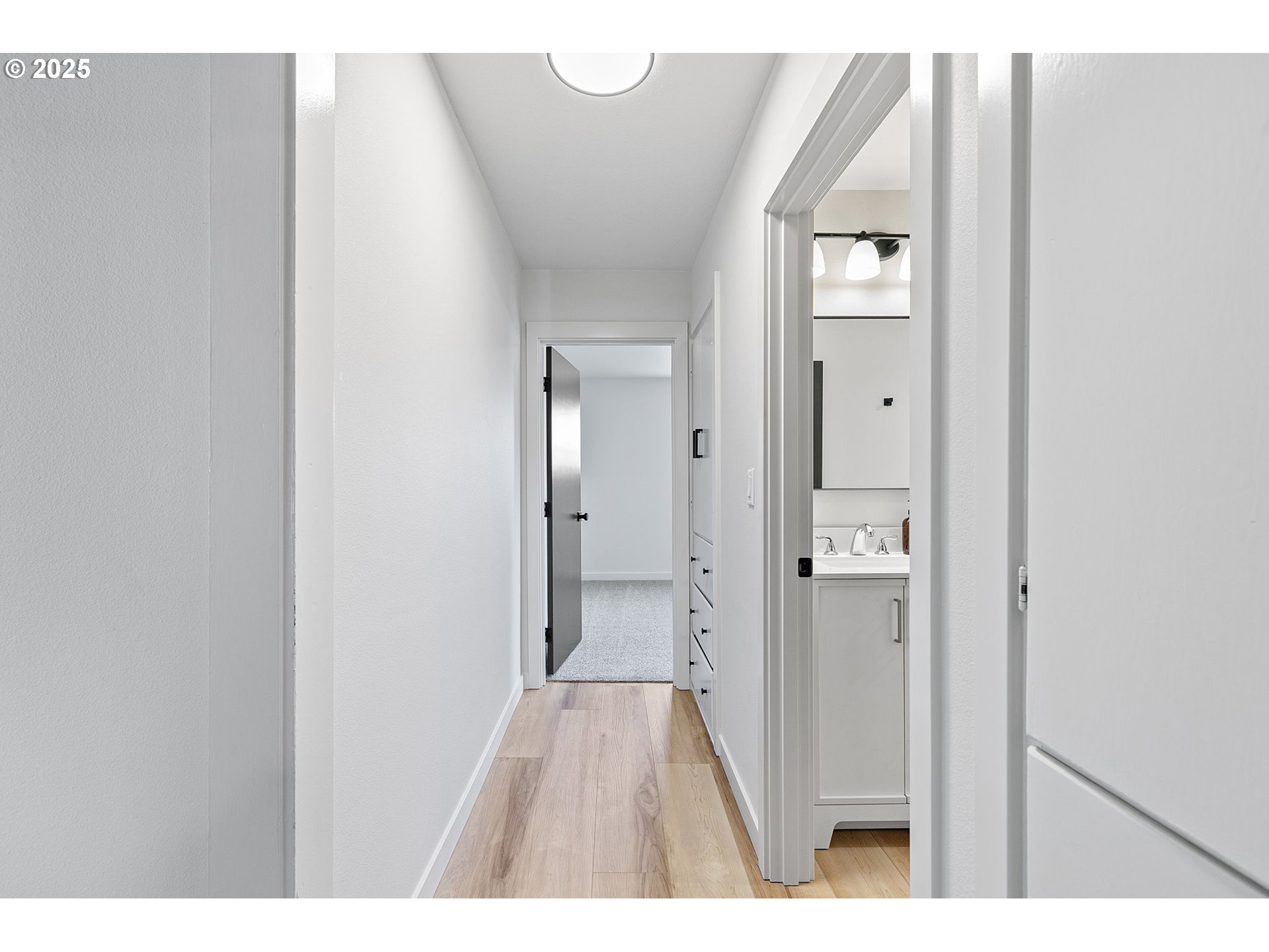 1938 7th Street Springfield, OR 97477 - Photo 27 of 48 a view of a bathroom from a hallway