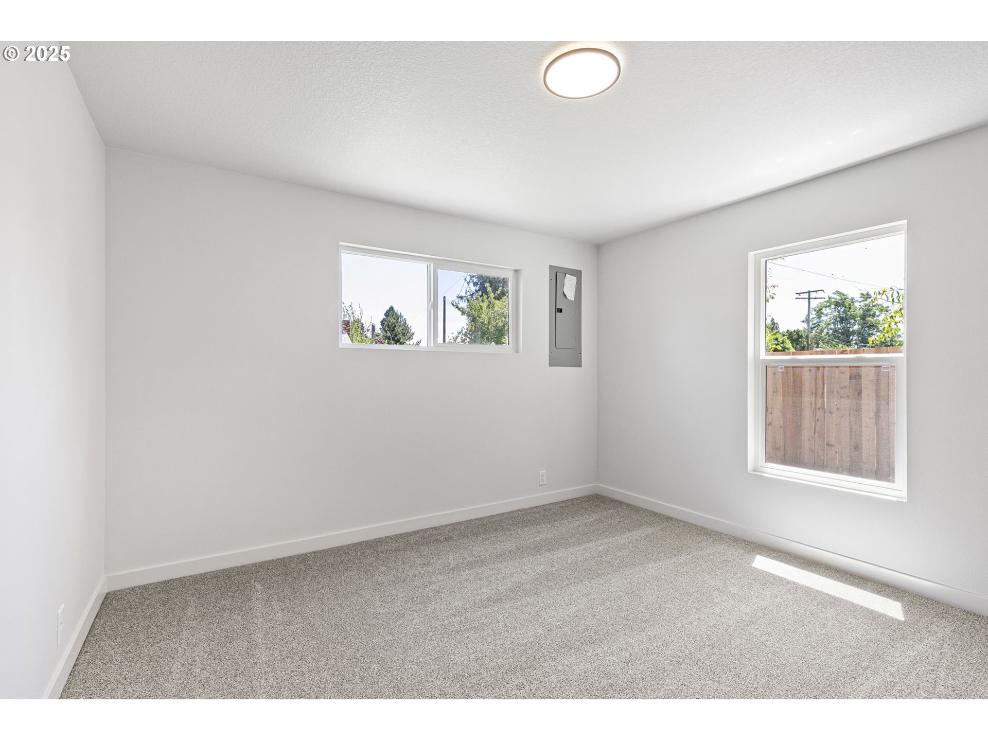 1938 7th Street Springfield, OR 97477 - Photo 30 of 48 an empty room with windows