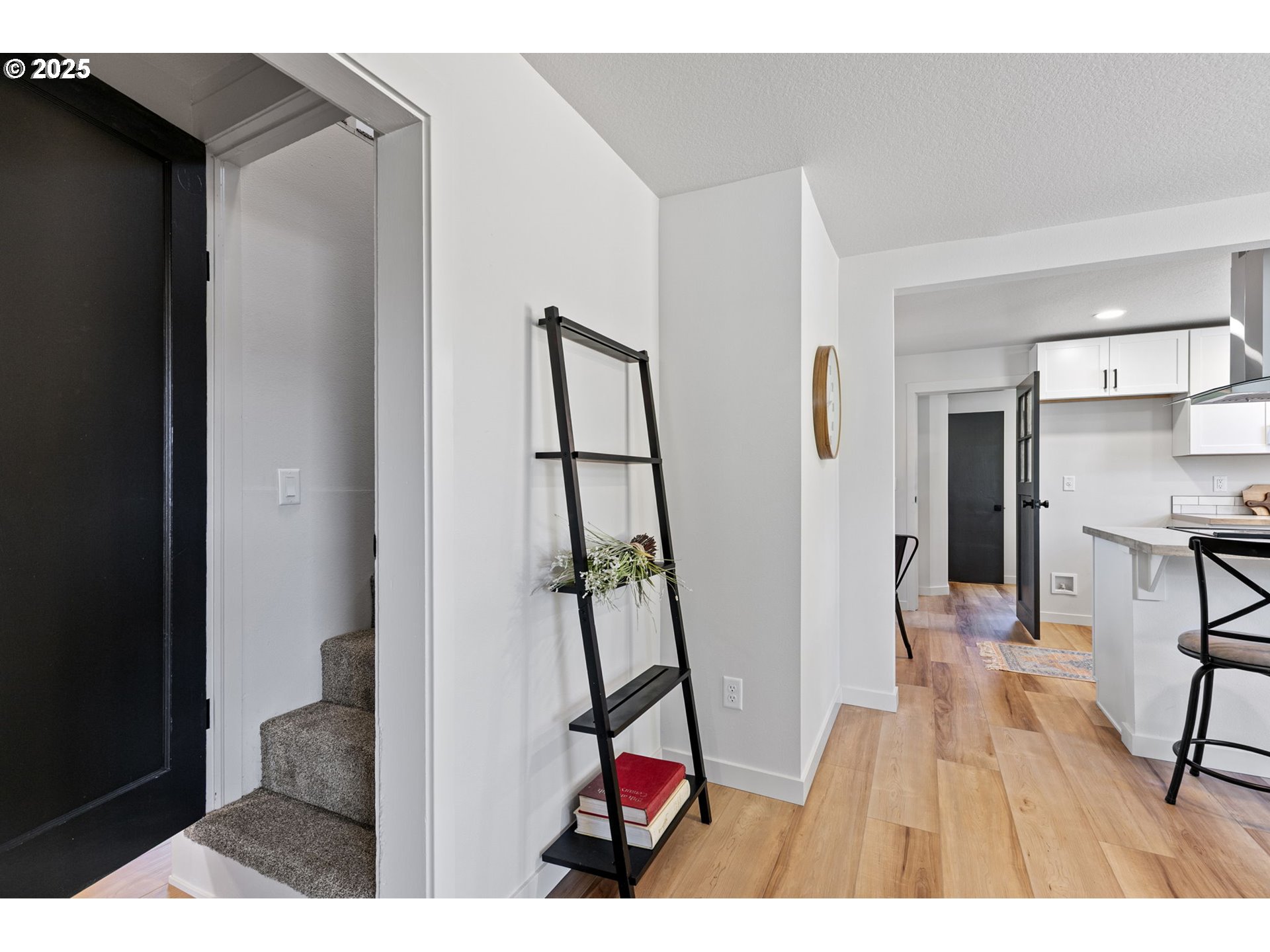 1938 7th Street Springfield, OR 97477 - Photo 32 of 48 a living room with furniture and a wooden floor