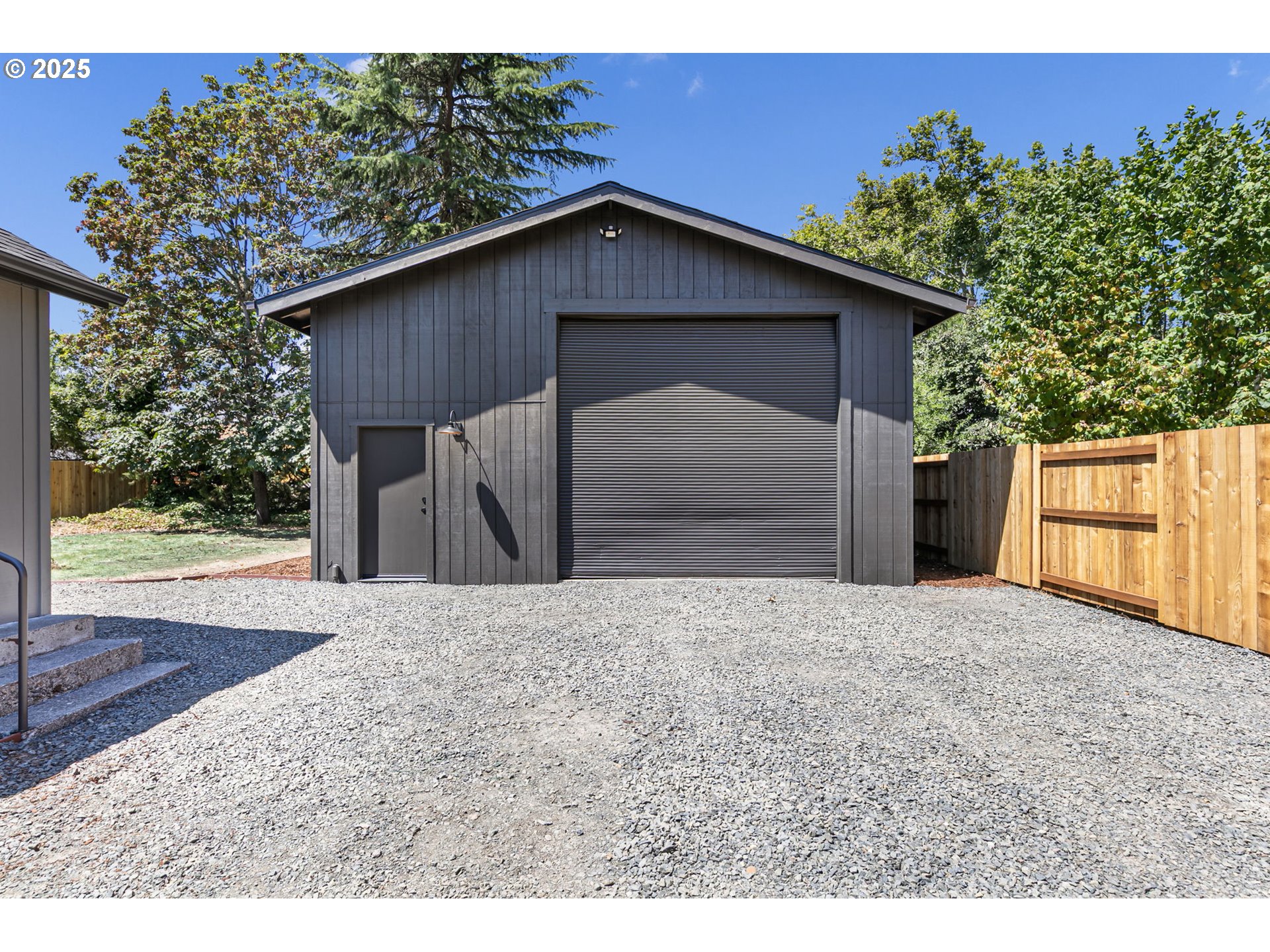 1938 7th Street Springfield, OR 97477 - Photo 39 of 48 a front view of a house with a yard and garage