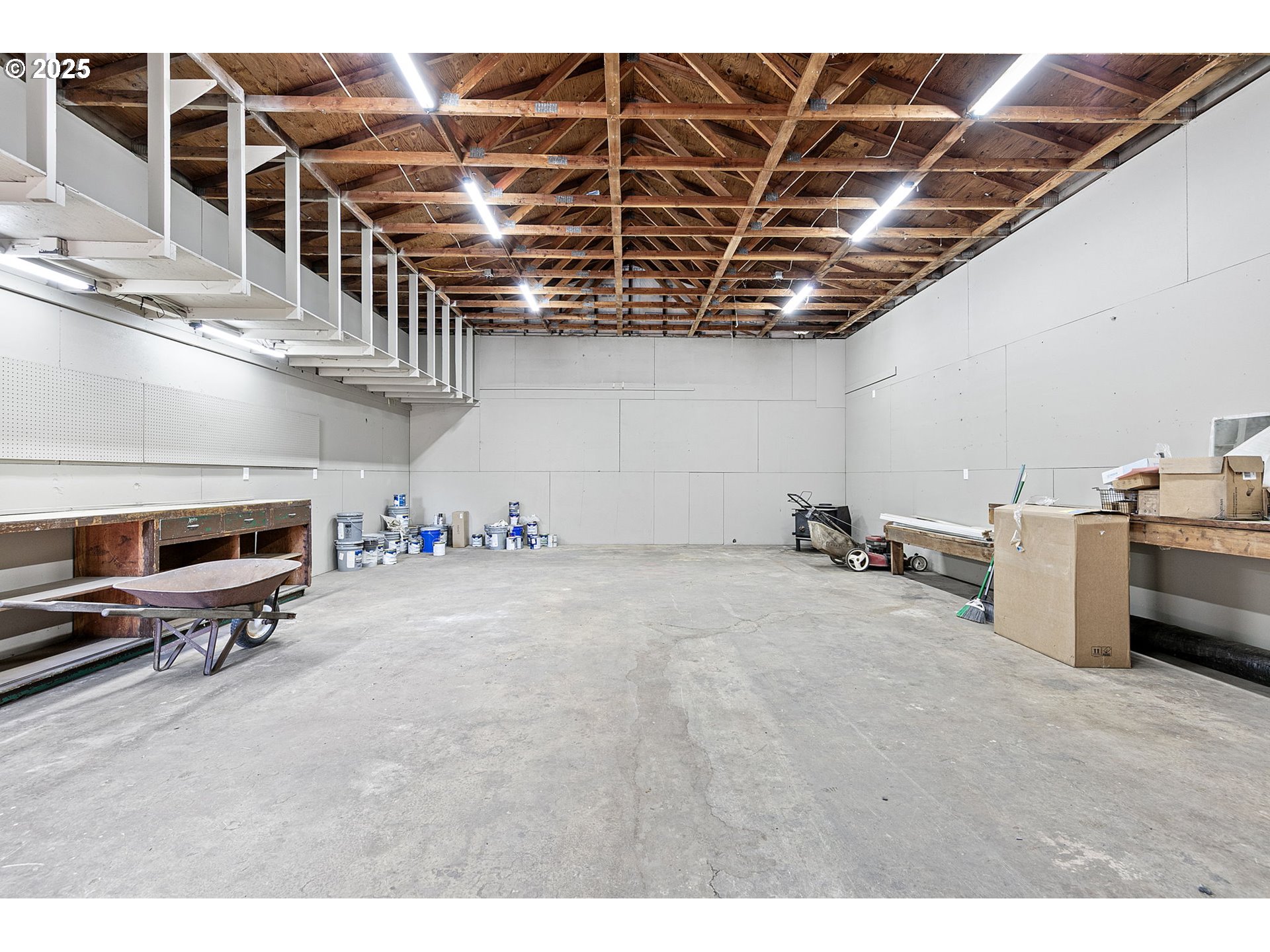 1938 7th Street Springfield, OR 97477 - Photo 40 of 48 a view of a storage & utility room with racks