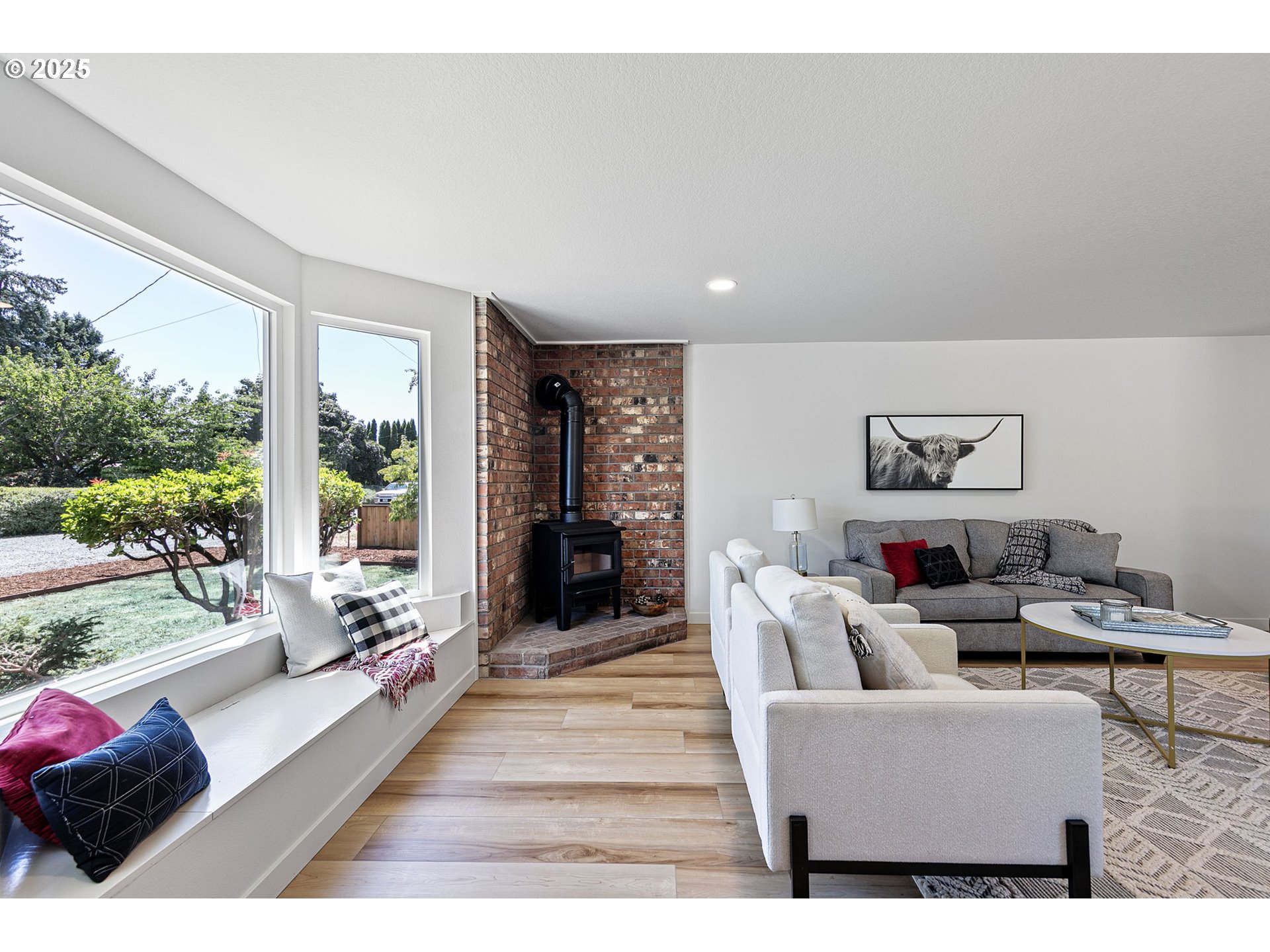 1938 7th Street Springfield, OR 97477 - Photo 4 of 48 a living room with furniture and a floor to ceiling window