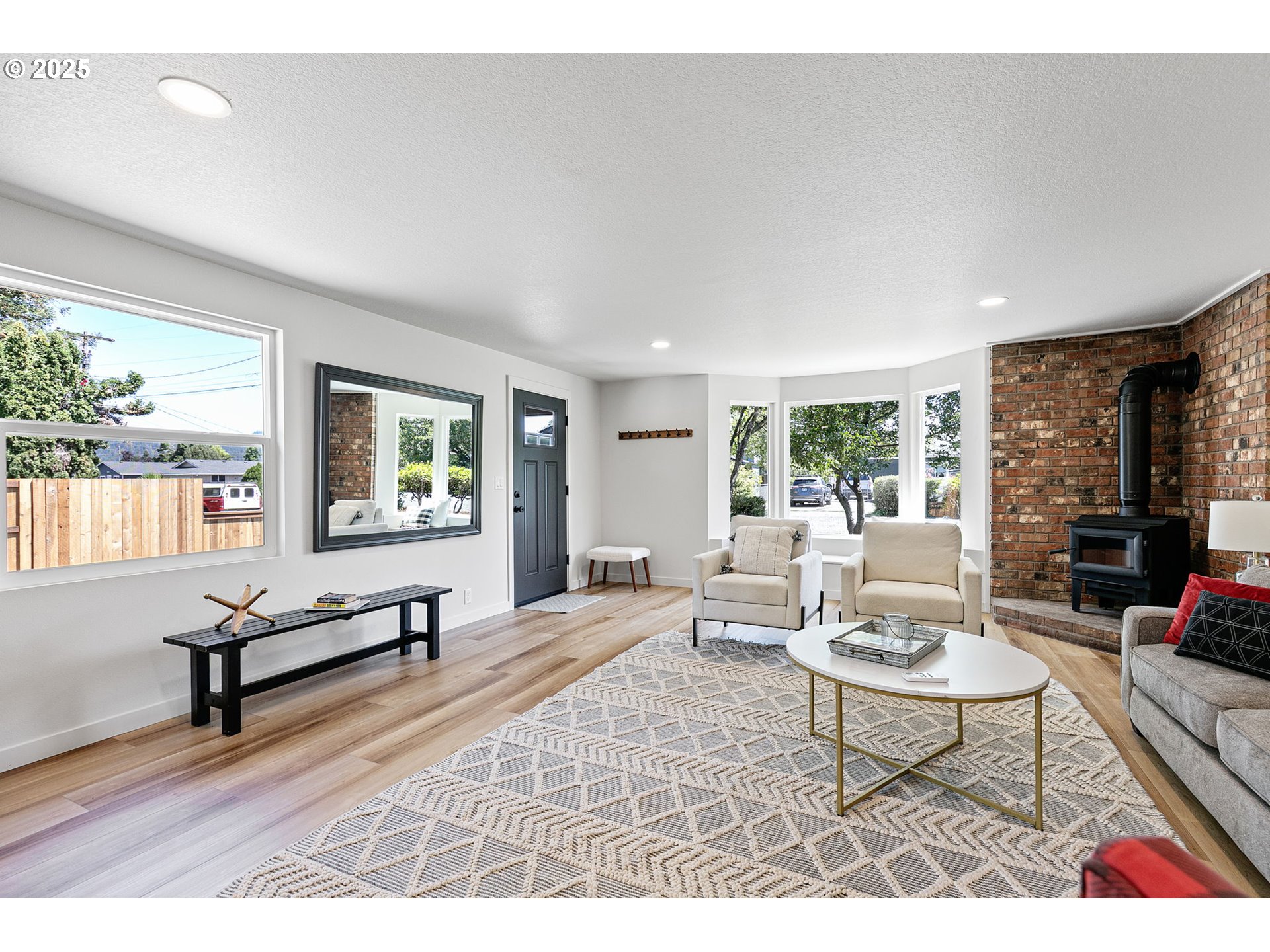 1938 7th Street Springfield, OR 97477 - Photo 9 of 48 a living room with furniture and a wooden floor