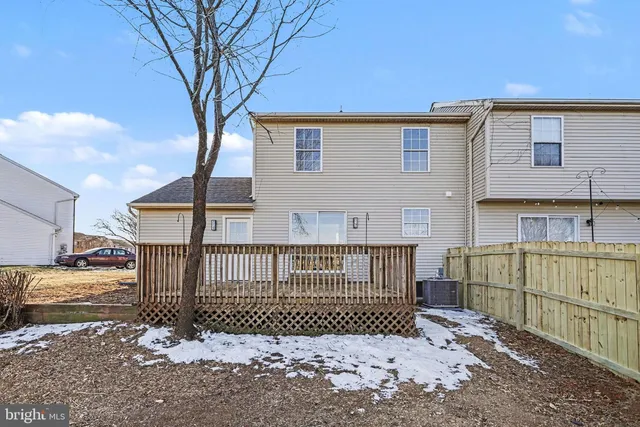a view of a swimming pool and an outdoor space