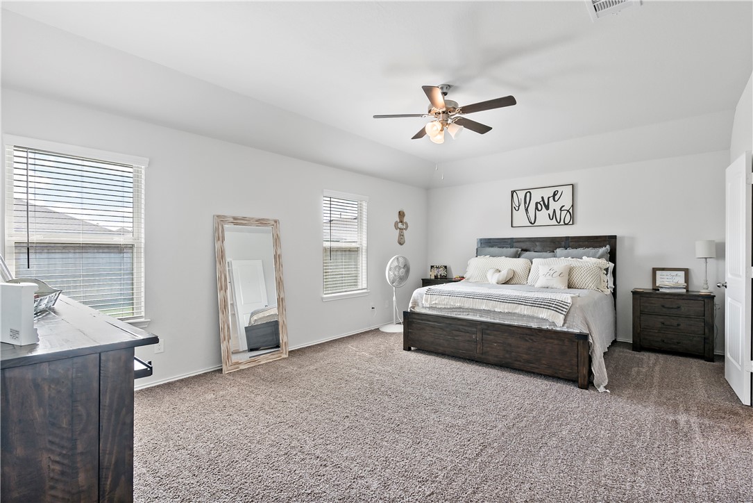 2413 Mulligan Lane Navasota, TX 77868 - Photo 5 of 6 a spacious bedroom with a bed and a window
