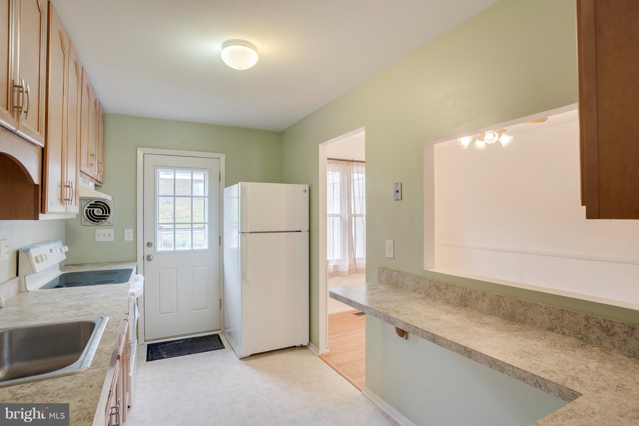 16 Colleton Court Baltimore, MD 21236 - Photo 8 of 25 Updated kitchen with maple cabinets