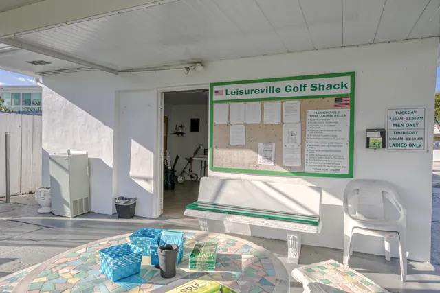 a view of swimming pool with a yard