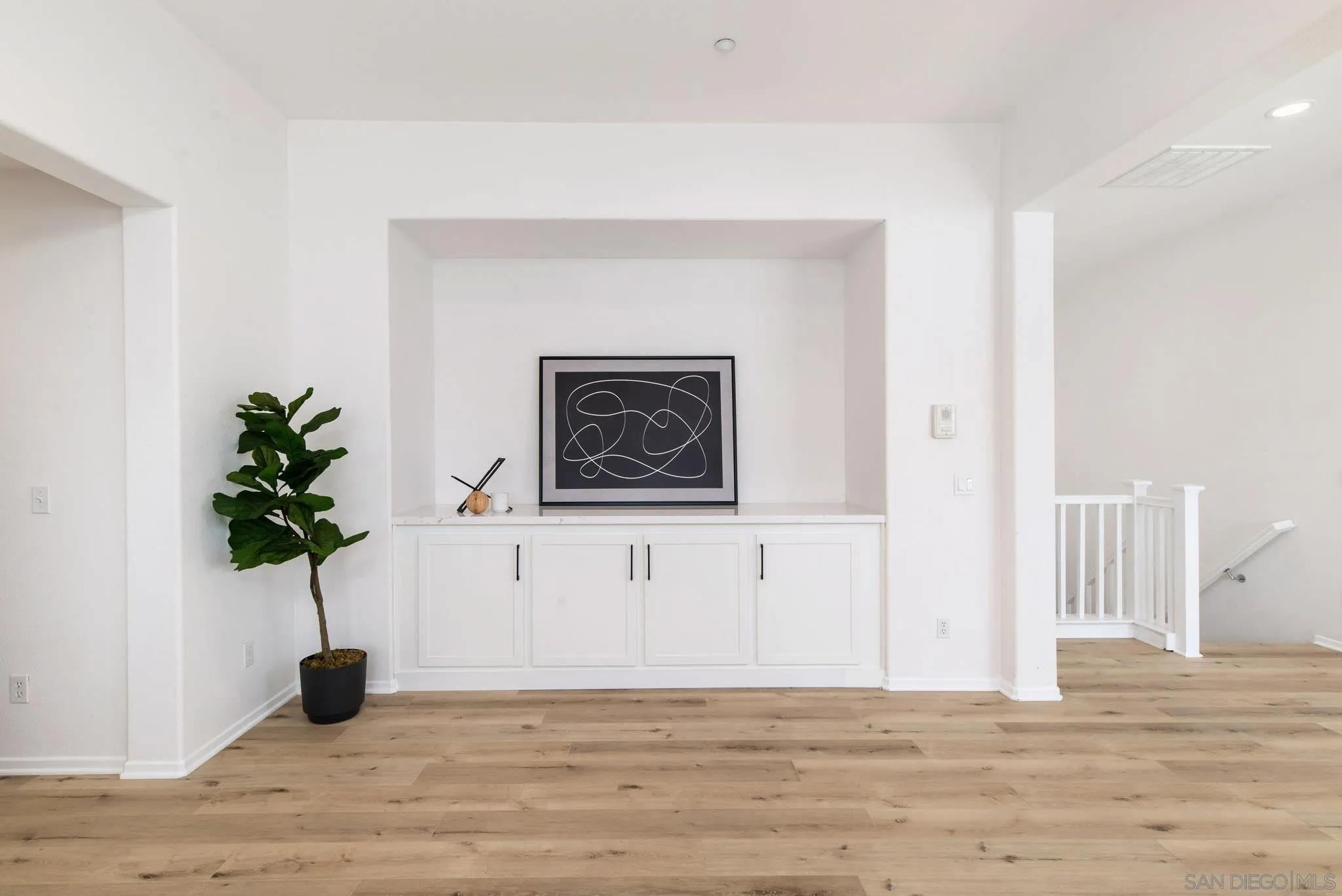 1694 Avery Road San Marcos, CA 92078 - Photo 13 of 22 a living room with furniture and a potted plant