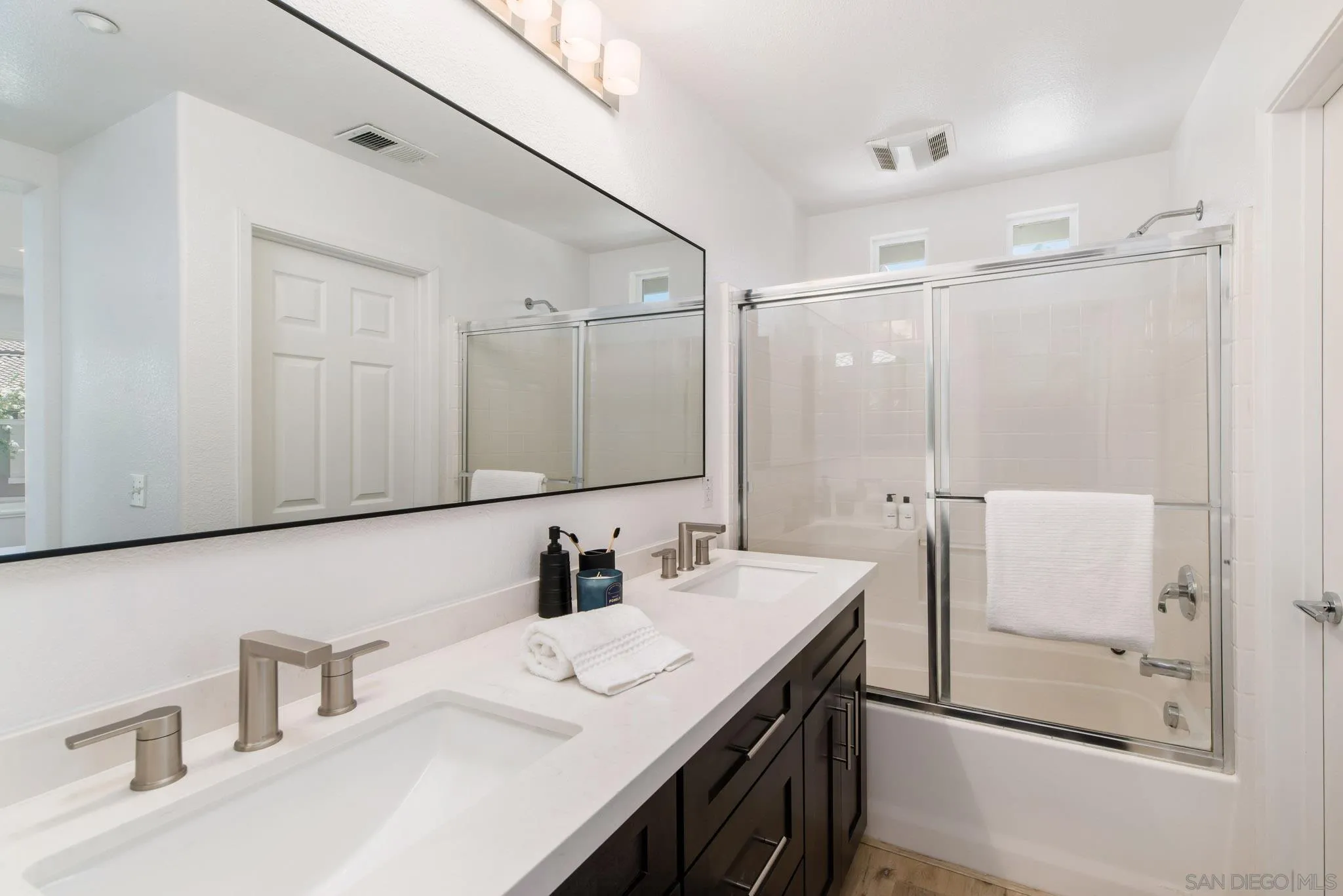 1694 Avery Road San Marcos, CA 92078 - Photo 18 of 22 a bathroom with a sink and a mirror