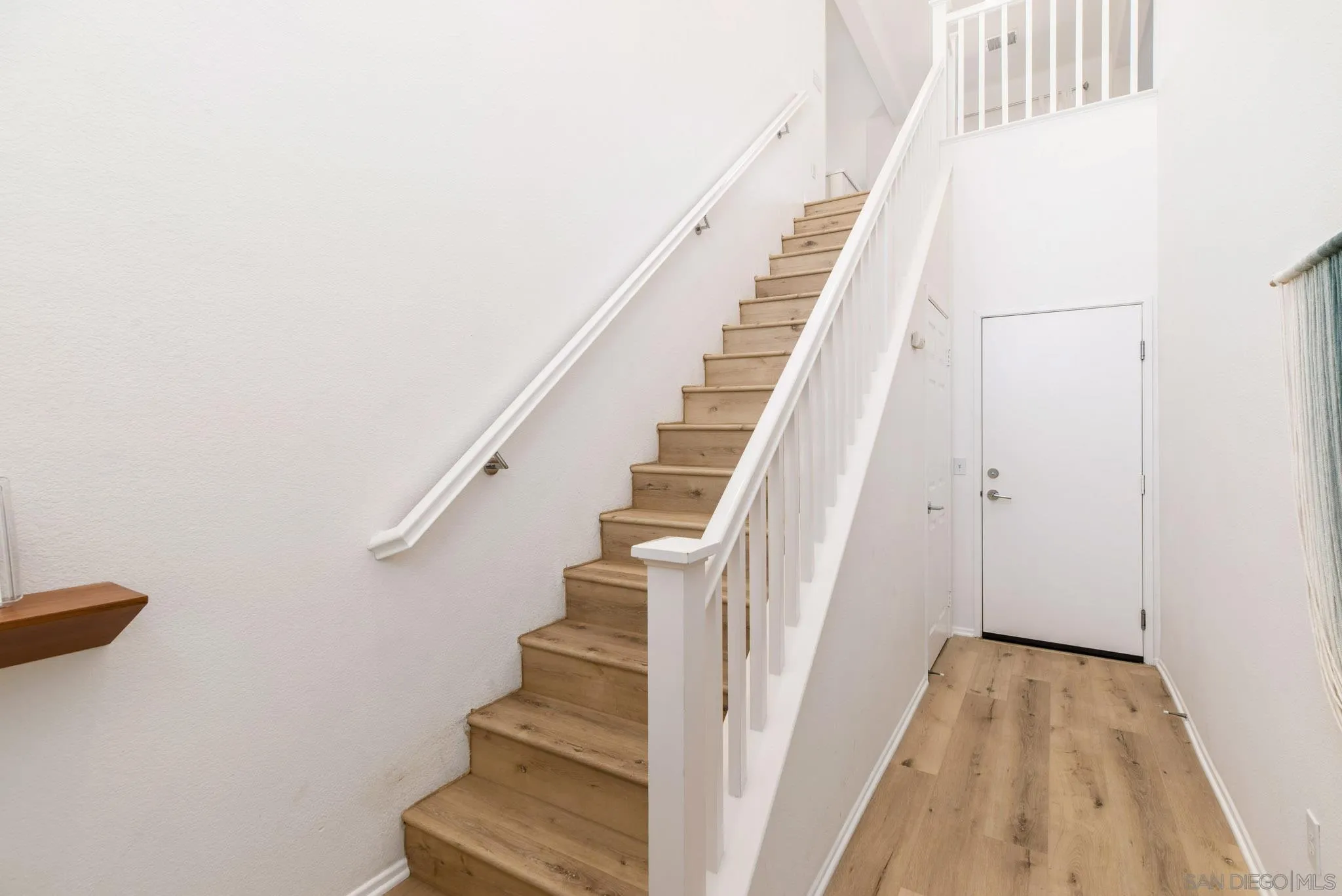 1694 Avery Road San Marcos, CA 92078 - Photo 2 of 22 a view of staircase with white walls and white walls