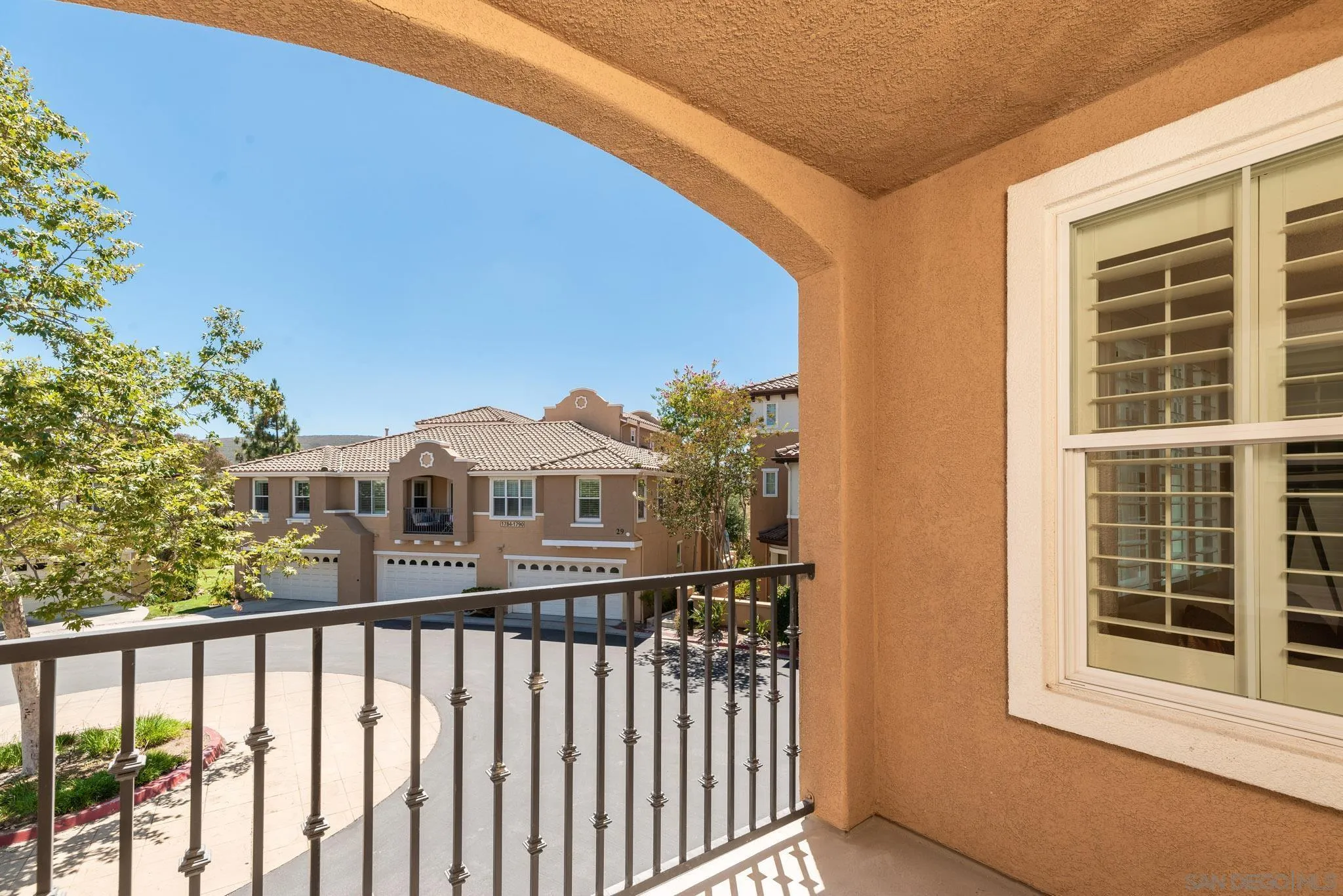 1694 Avery Road San Marcos, CA 92078 - Photo 22 of 22 a view of a balcony with a couple of potted plants