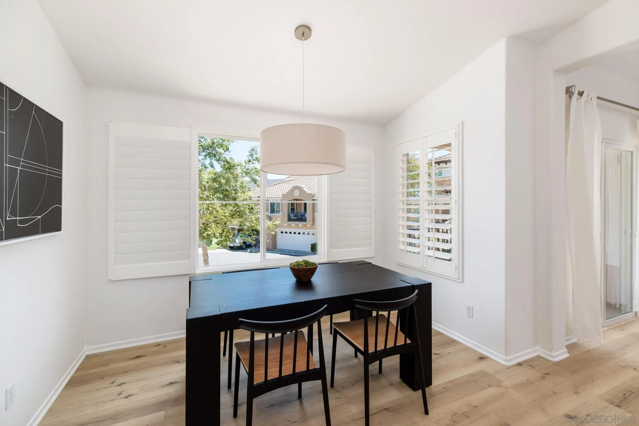 1694 Avery Road San Marcos, CA 92078 - Photo 7 of 22 a view of a workspace with furniture and a window