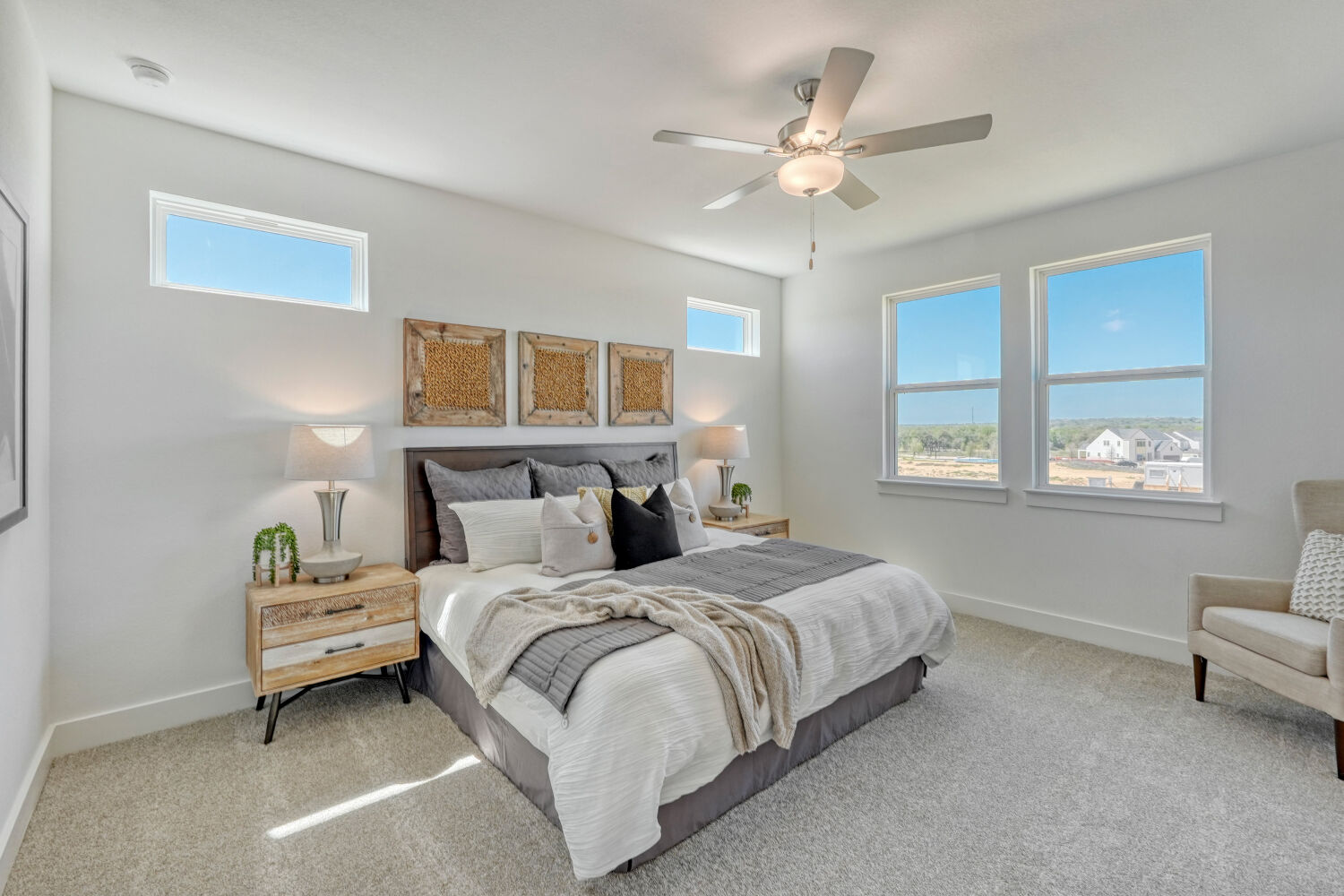 141 Sincere Drive Kyle, TX 78640 - Photo 15 of 23 a bedroom with a large bed and a window