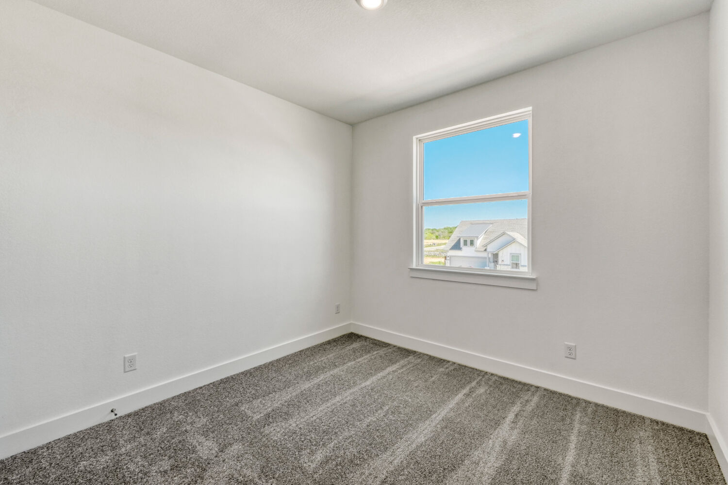141 Sincere Drive Kyle, TX 78640 - Photo 19 of 23 an empty room with windows