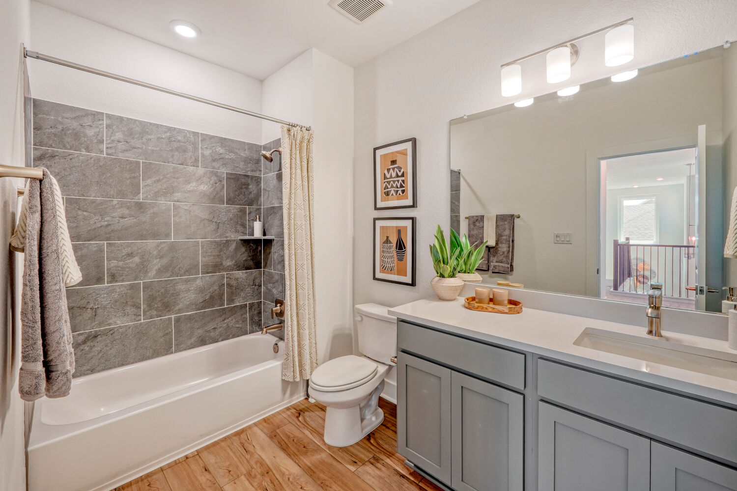 141 Sincere Drive Kyle, TX 78640 - Photo 21 of 23 a bathroom with a sink toilet and shower